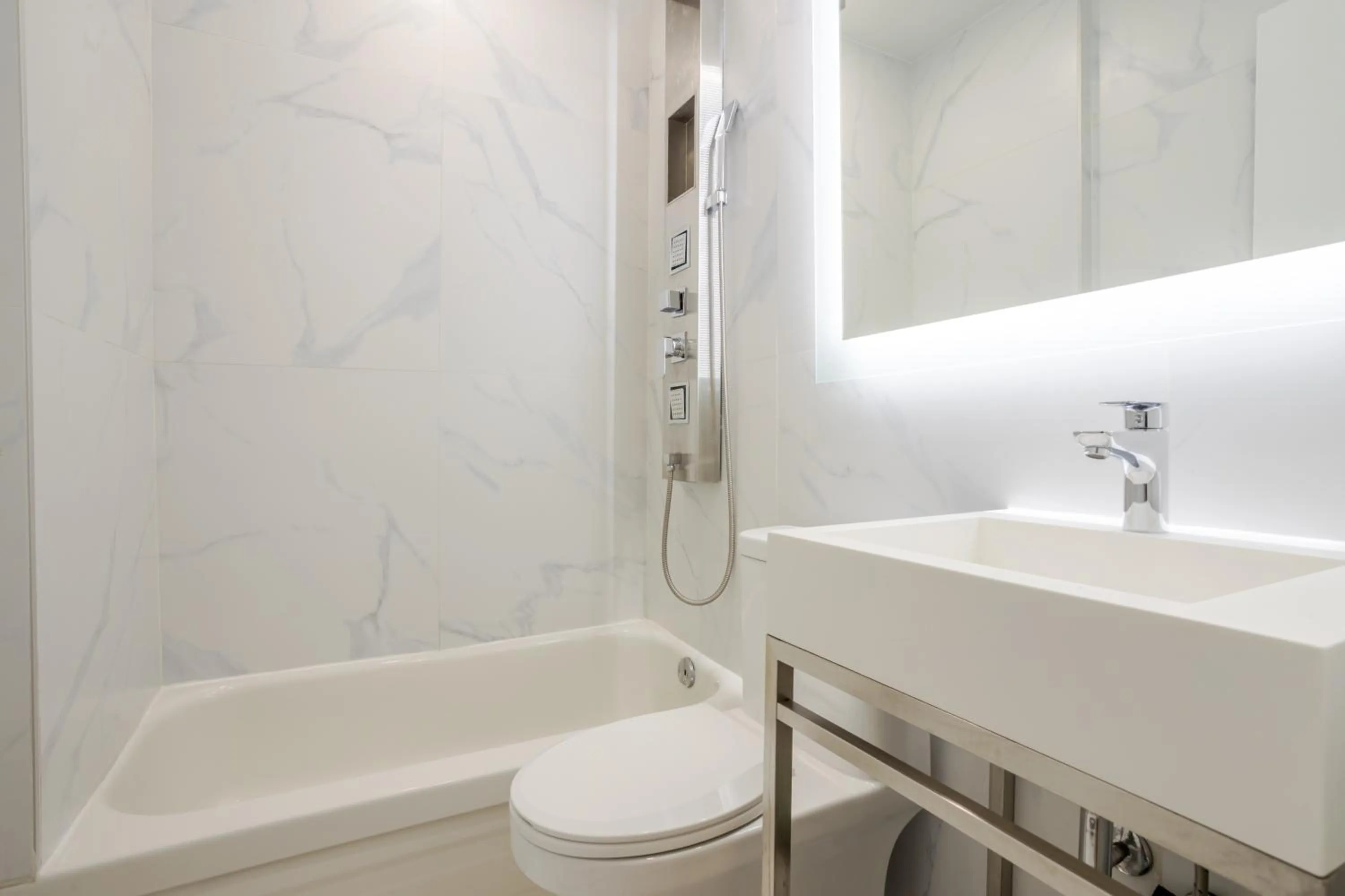 Shower in Olympia Hotel by Lodgo