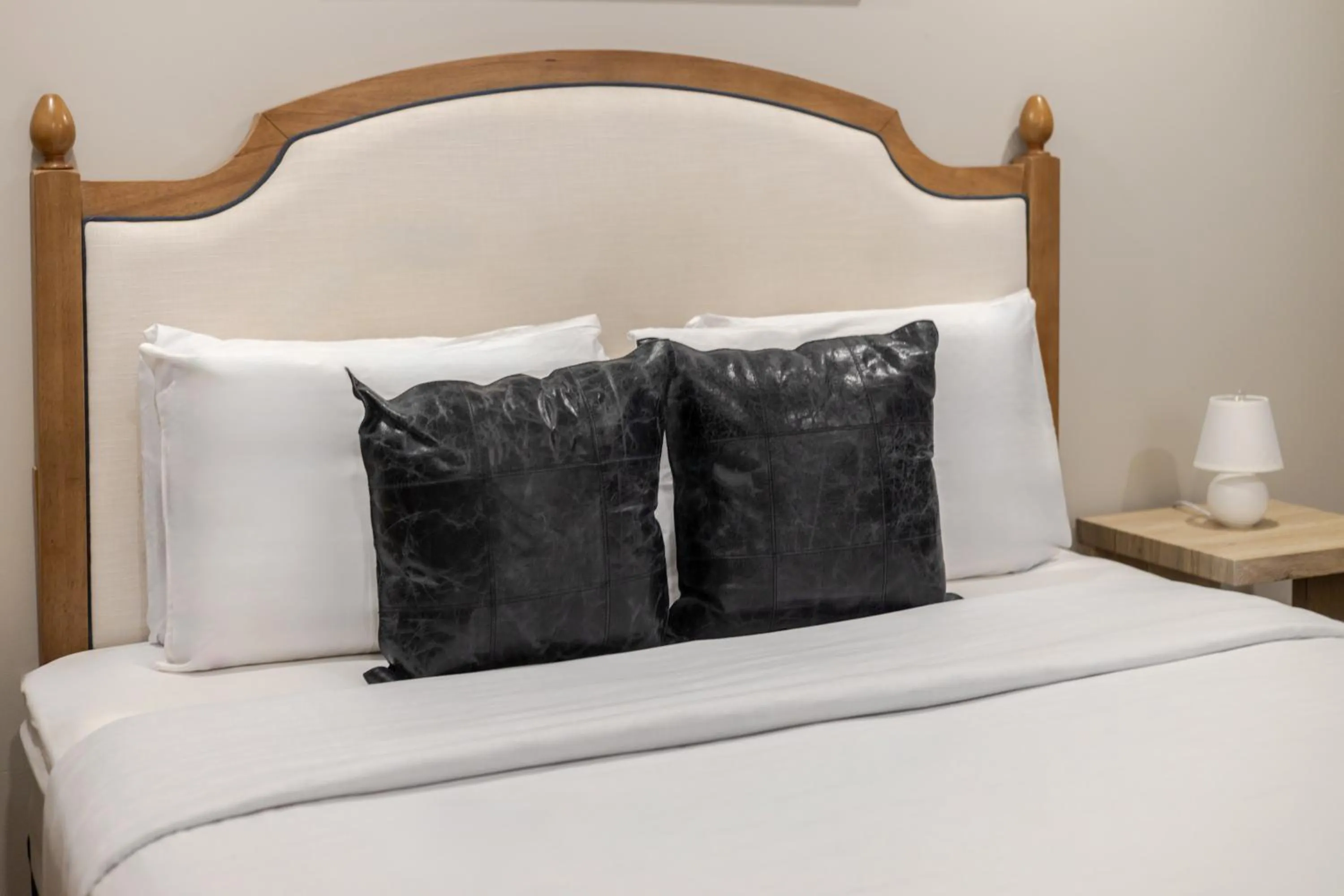 Bed in Olympia Hotel by Lodgo