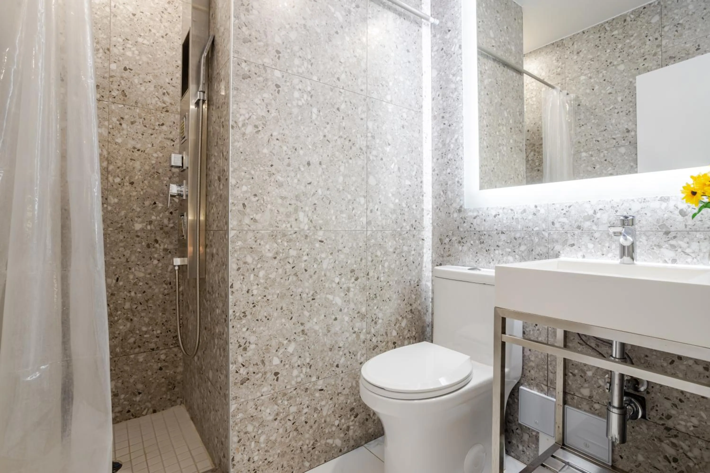 Shower in Olympia Hotel by Lodgo