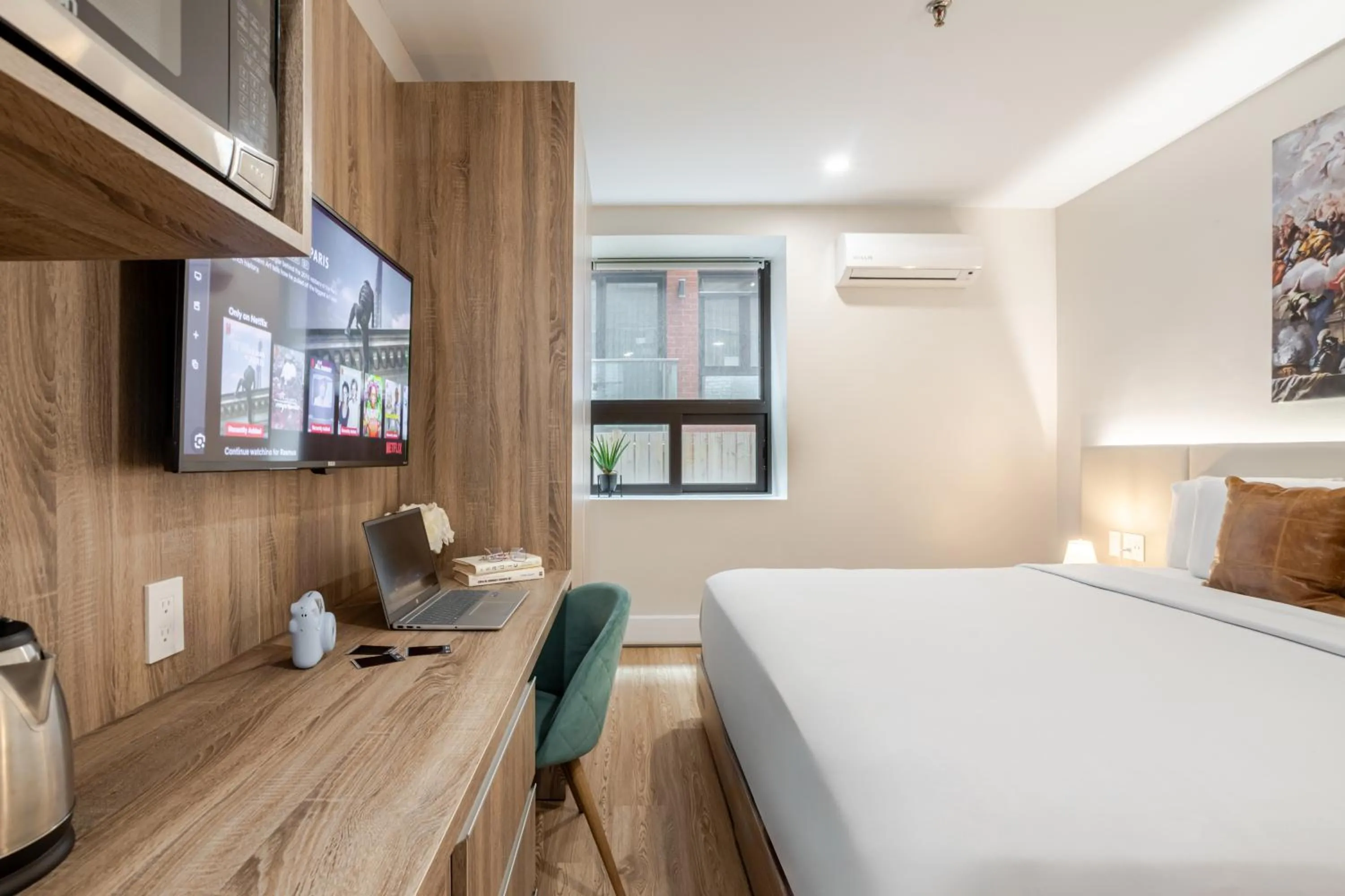 Bed in Olympia Hotel by Lodgo