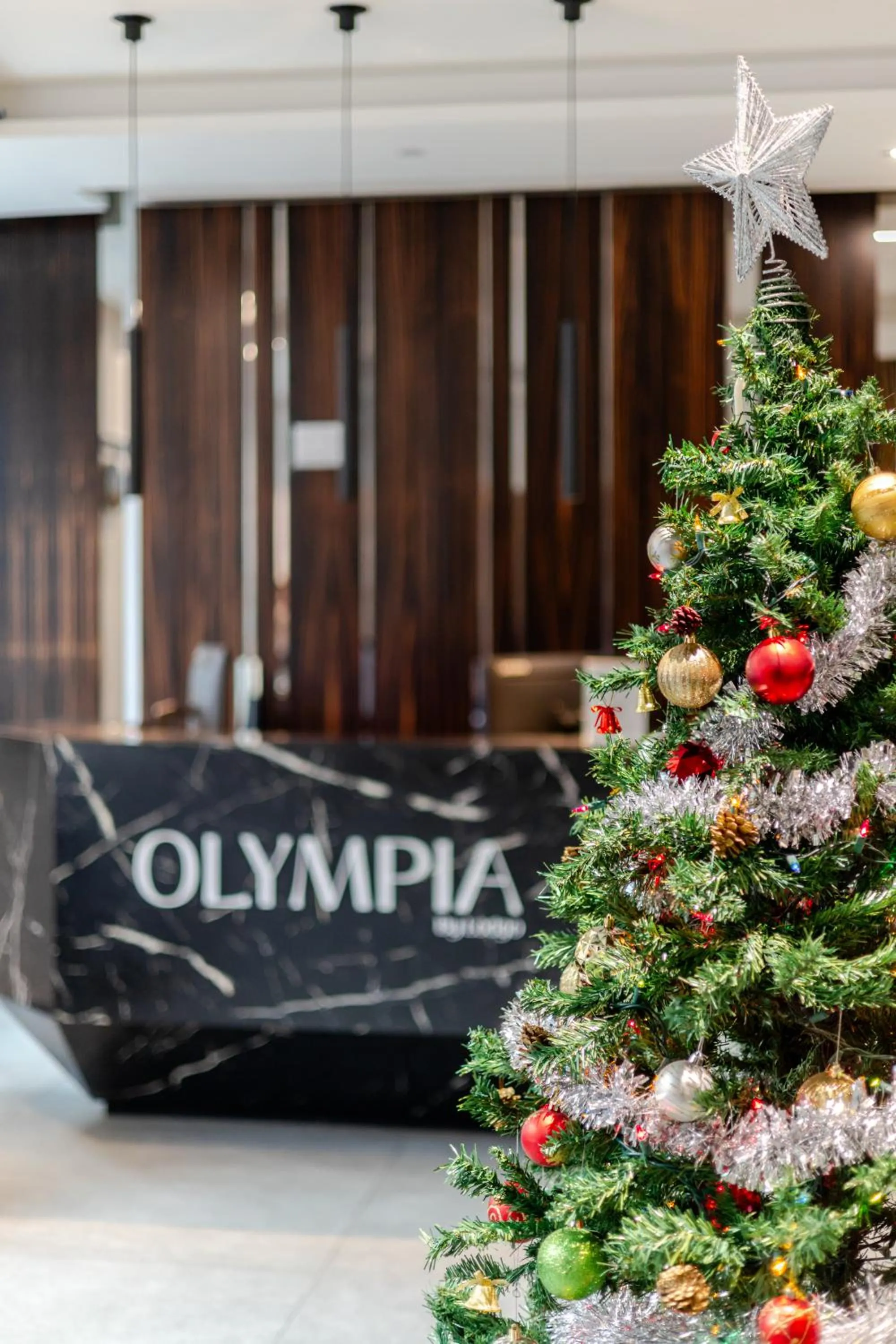 Olympia Hotel by Lodgo