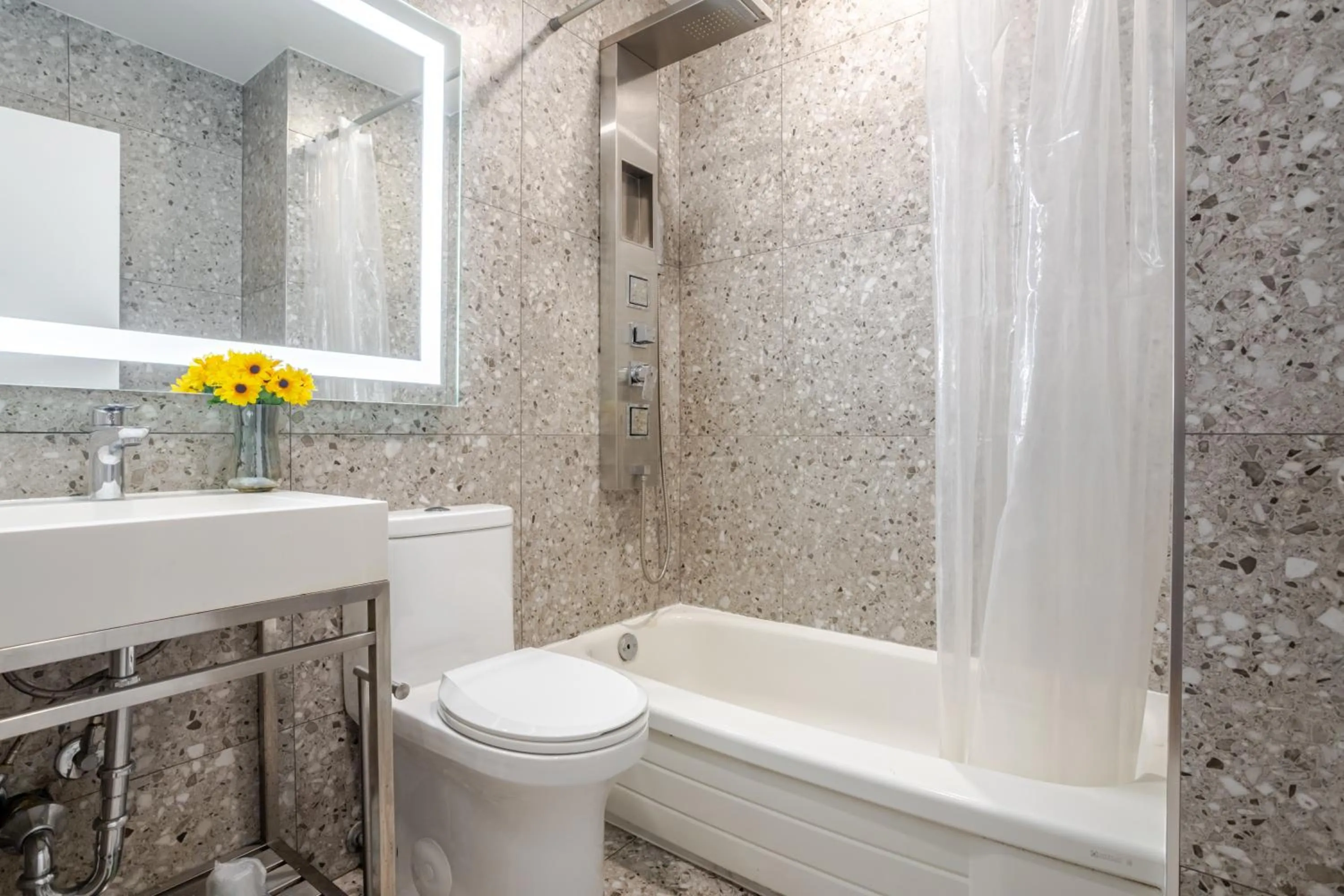 Shower in Olympia Hotel by Lodgo