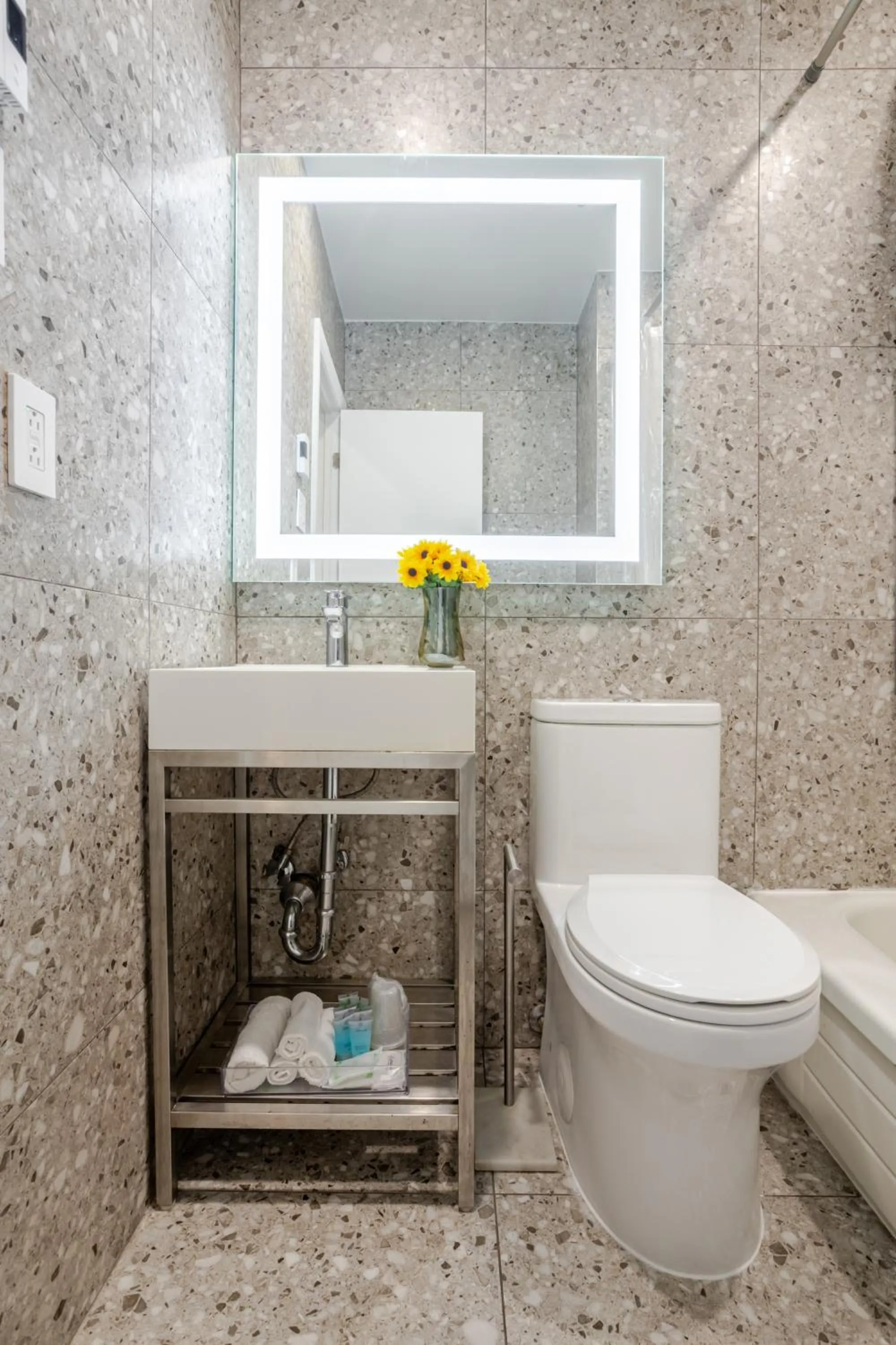 Shower in Olympia Hotel by Lodgo