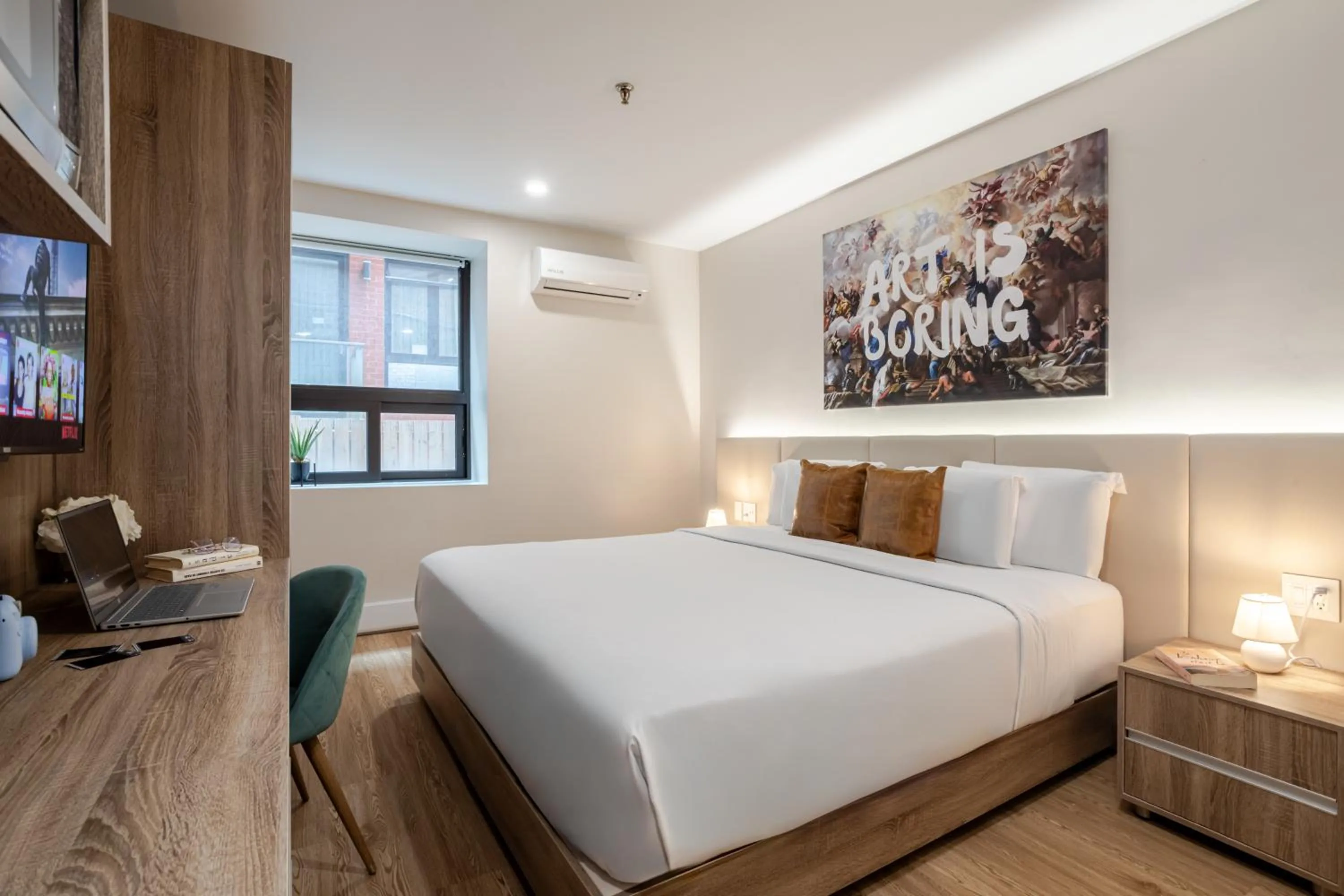 Bed in Olympia Hotel by Lodgo