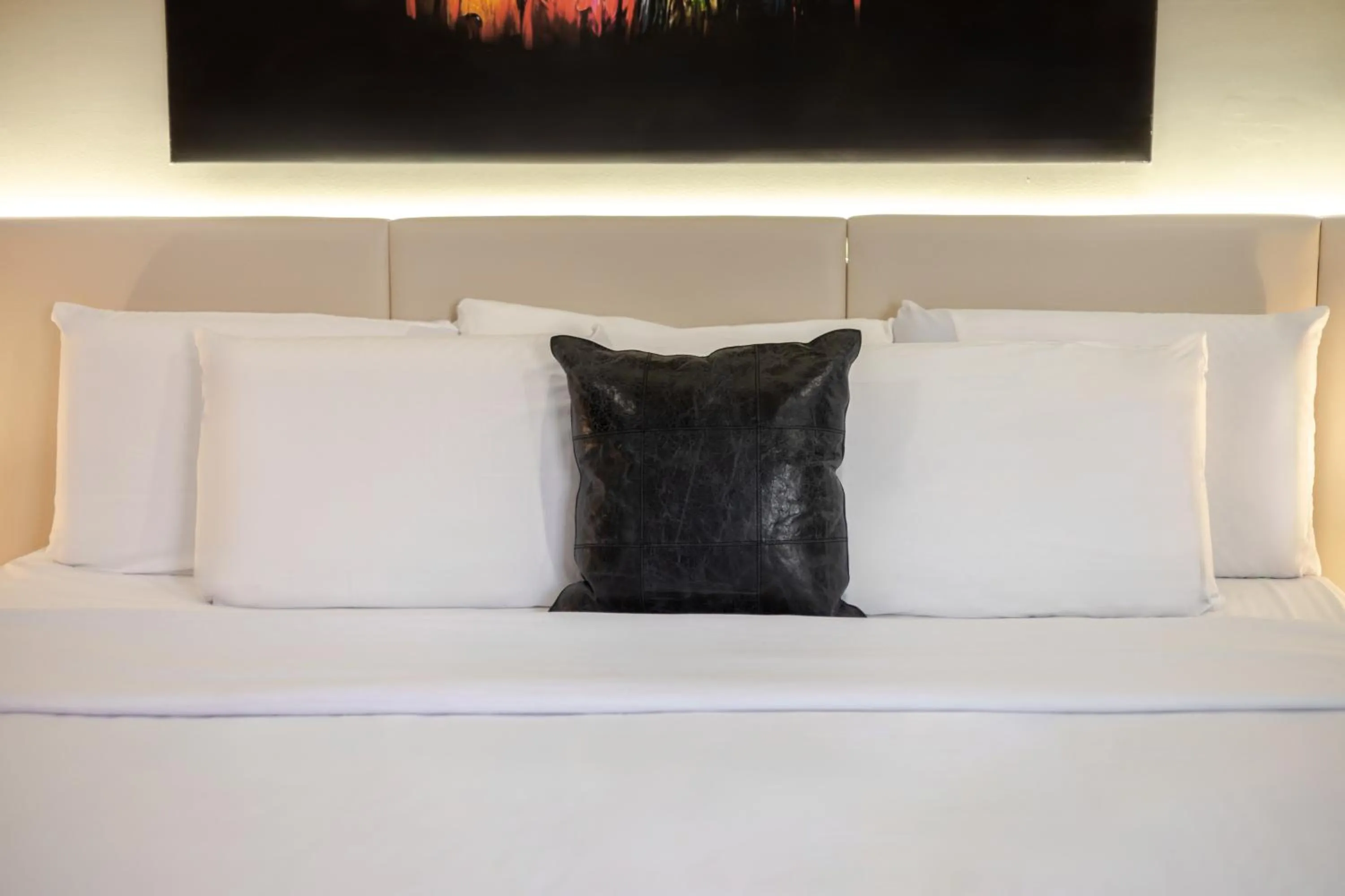 Bed in Olympia Hotel by Lodgo