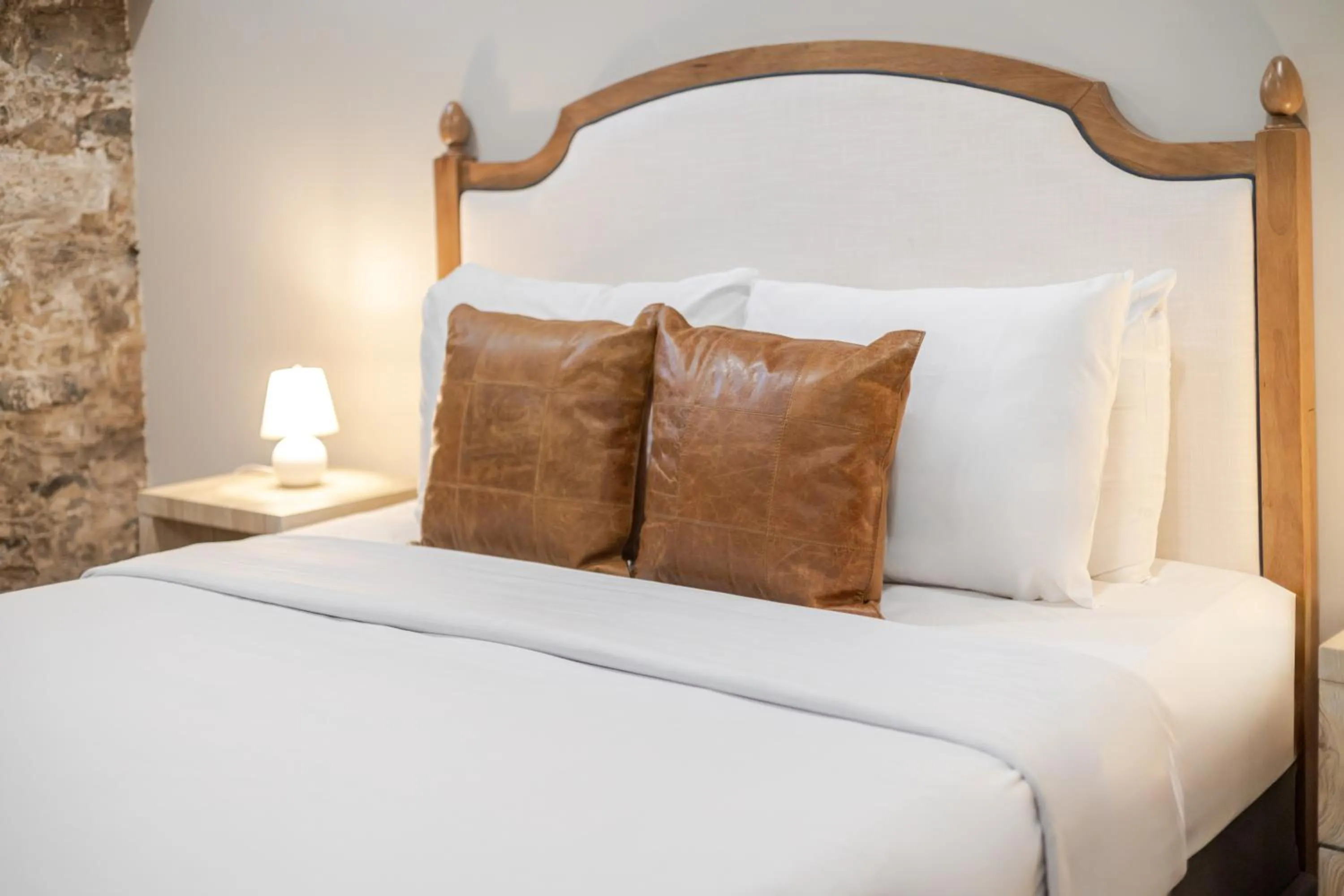 Bed in Olympia Hotel by Lodgo