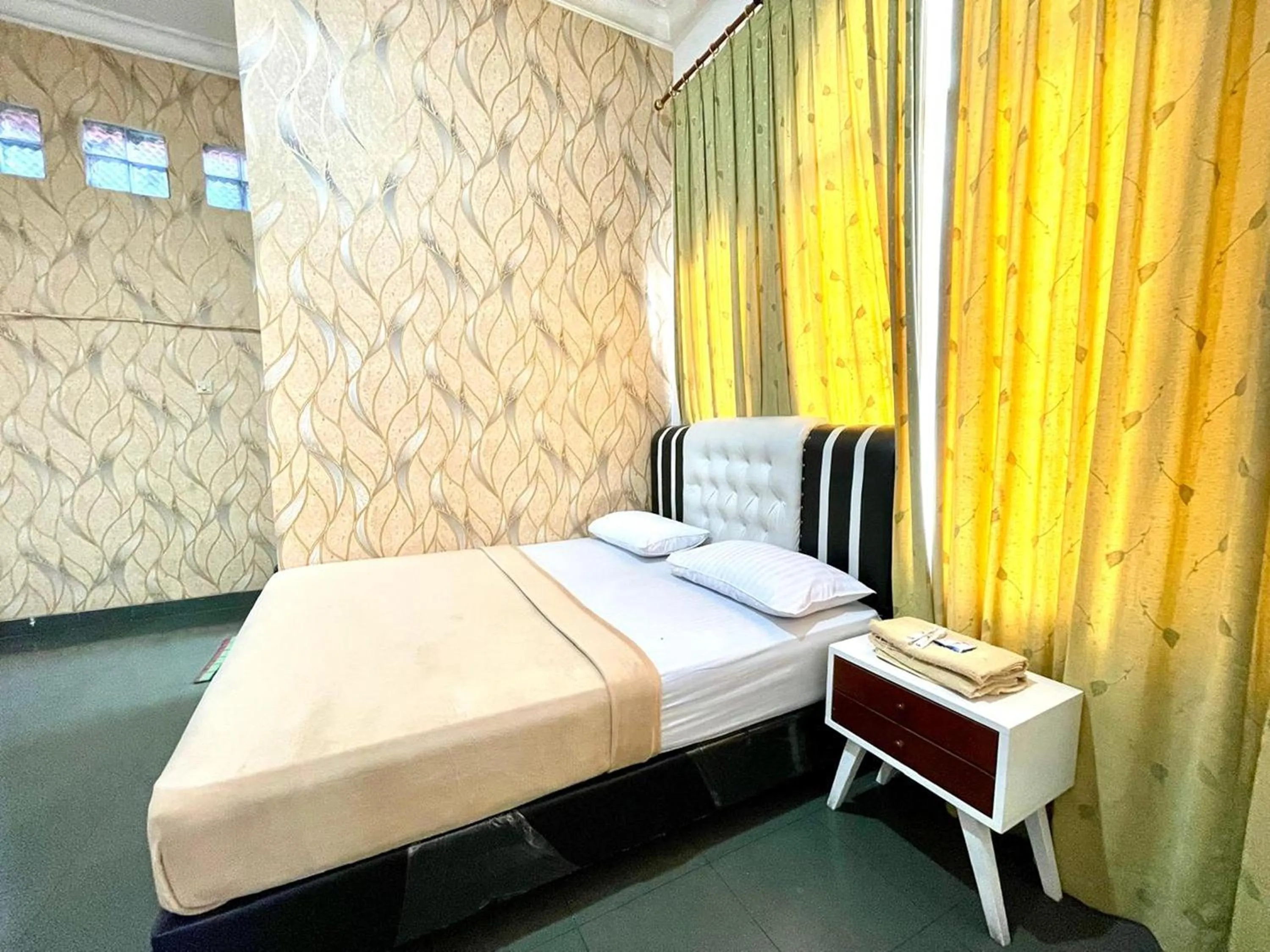 Bed in Yani Guesthouse