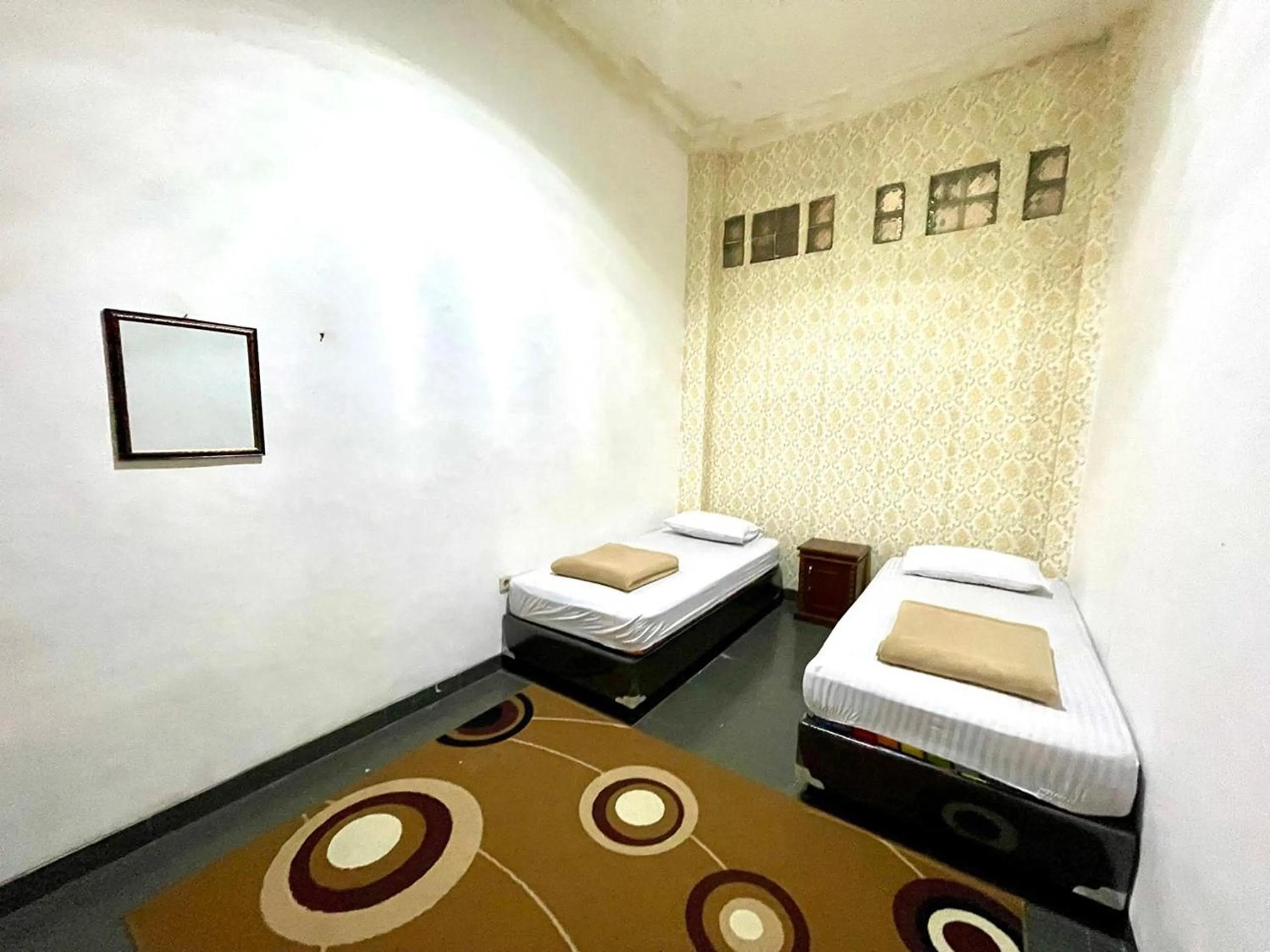 Bed in Yani Guesthouse