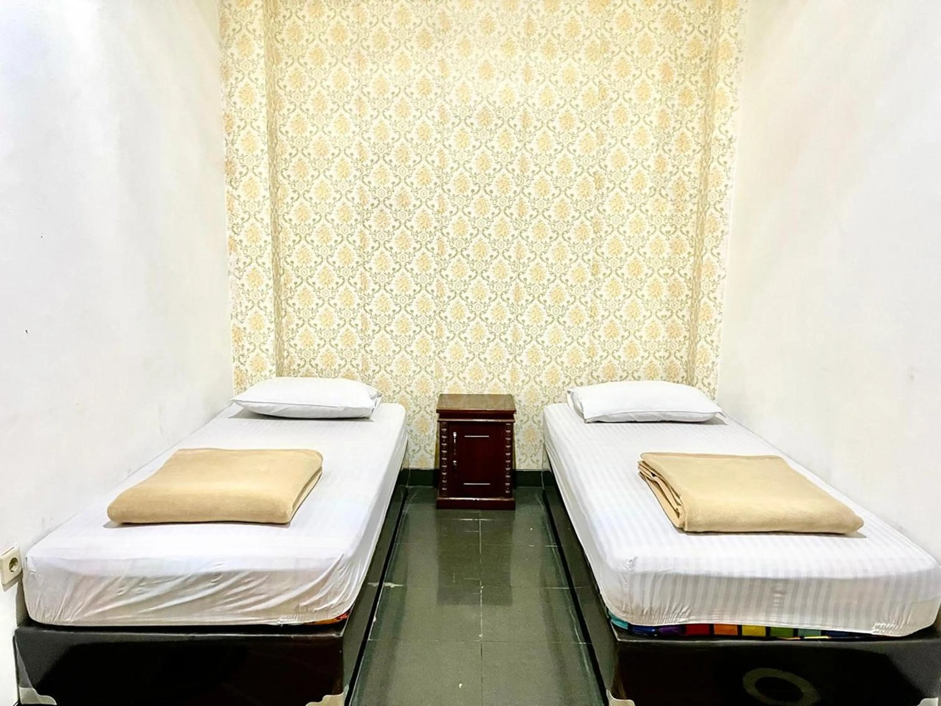 Bed in Yani Guesthouse