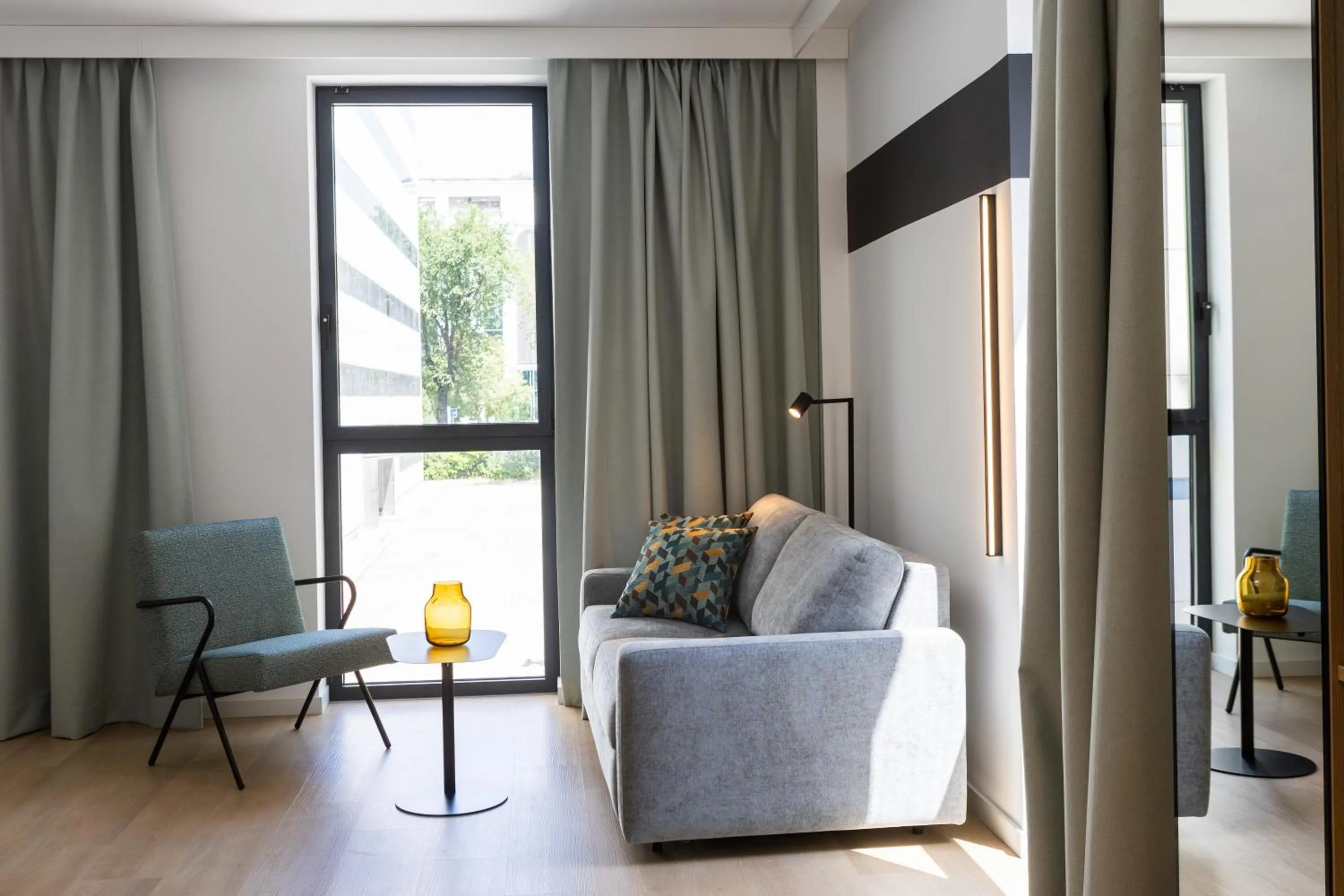 Living room in Spark By Hilton Madrid Alcala