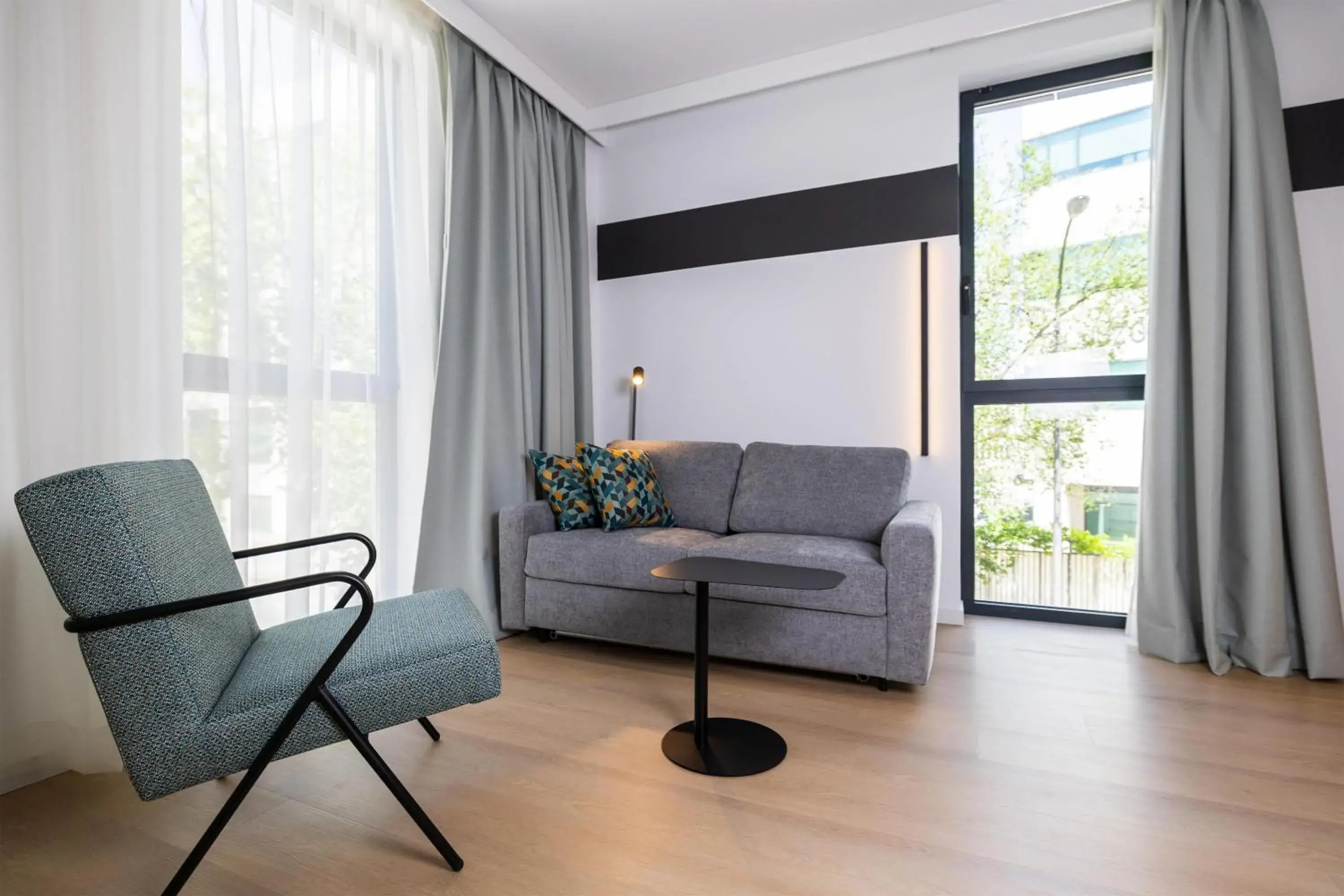 Living room in Spark By Hilton Madrid Alcala Living room in Spark By Hilton Madrid Alcala