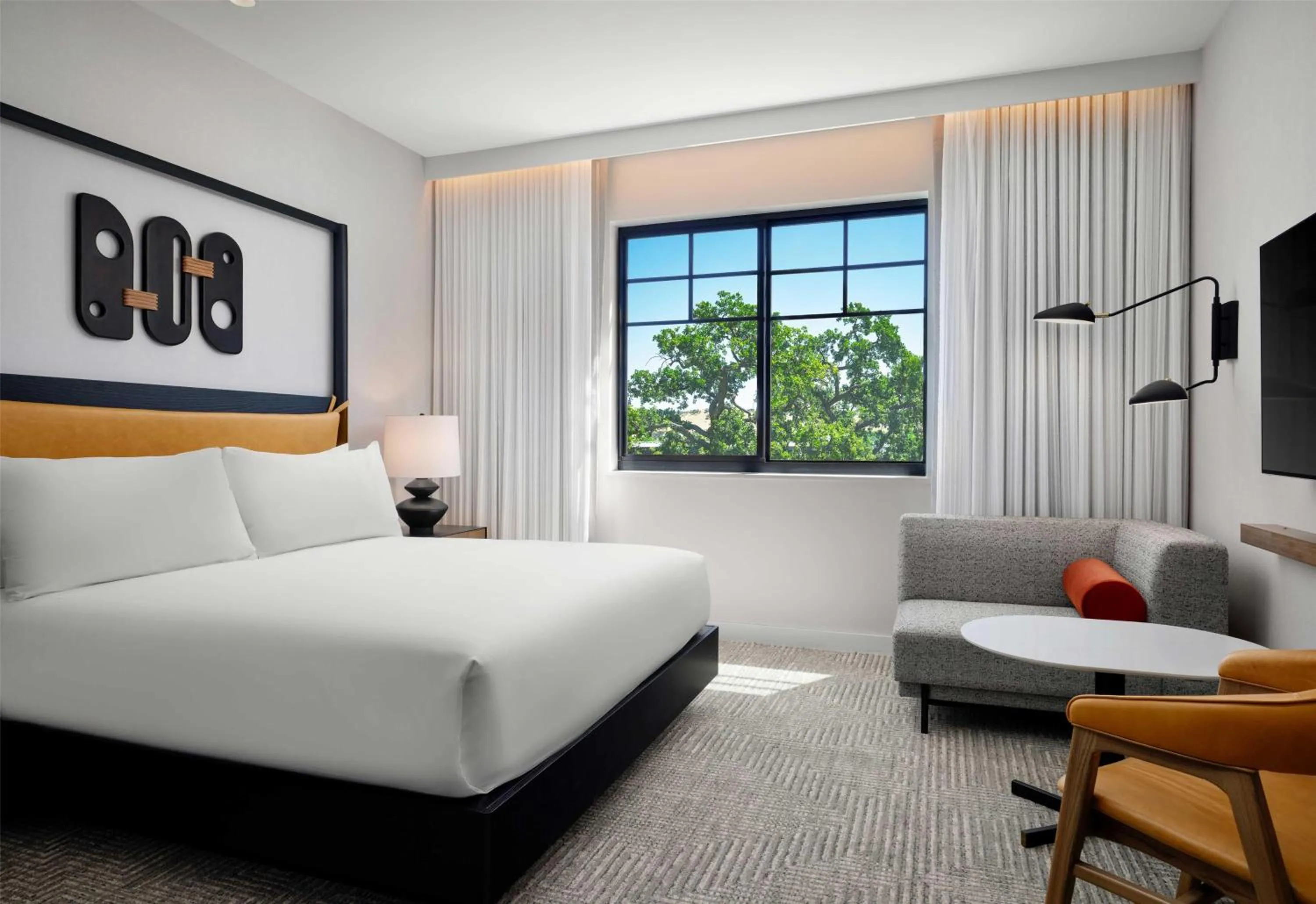 Living room, Bed in The Ava Hotel Paso Robles, Curio Collection By Hilton