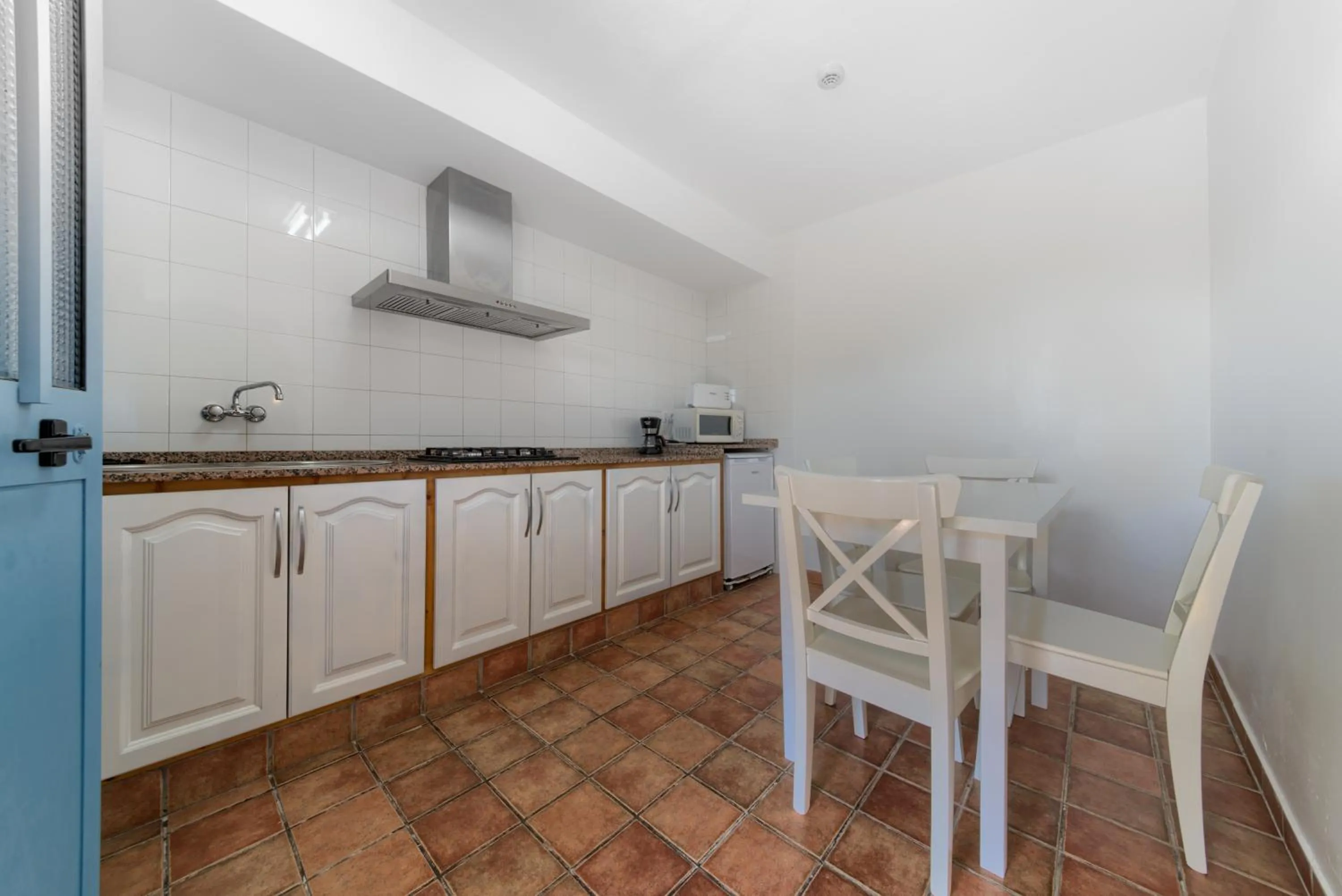 Kitchen or kitchenette in Dulce Nombre Hotel - Apartamentos