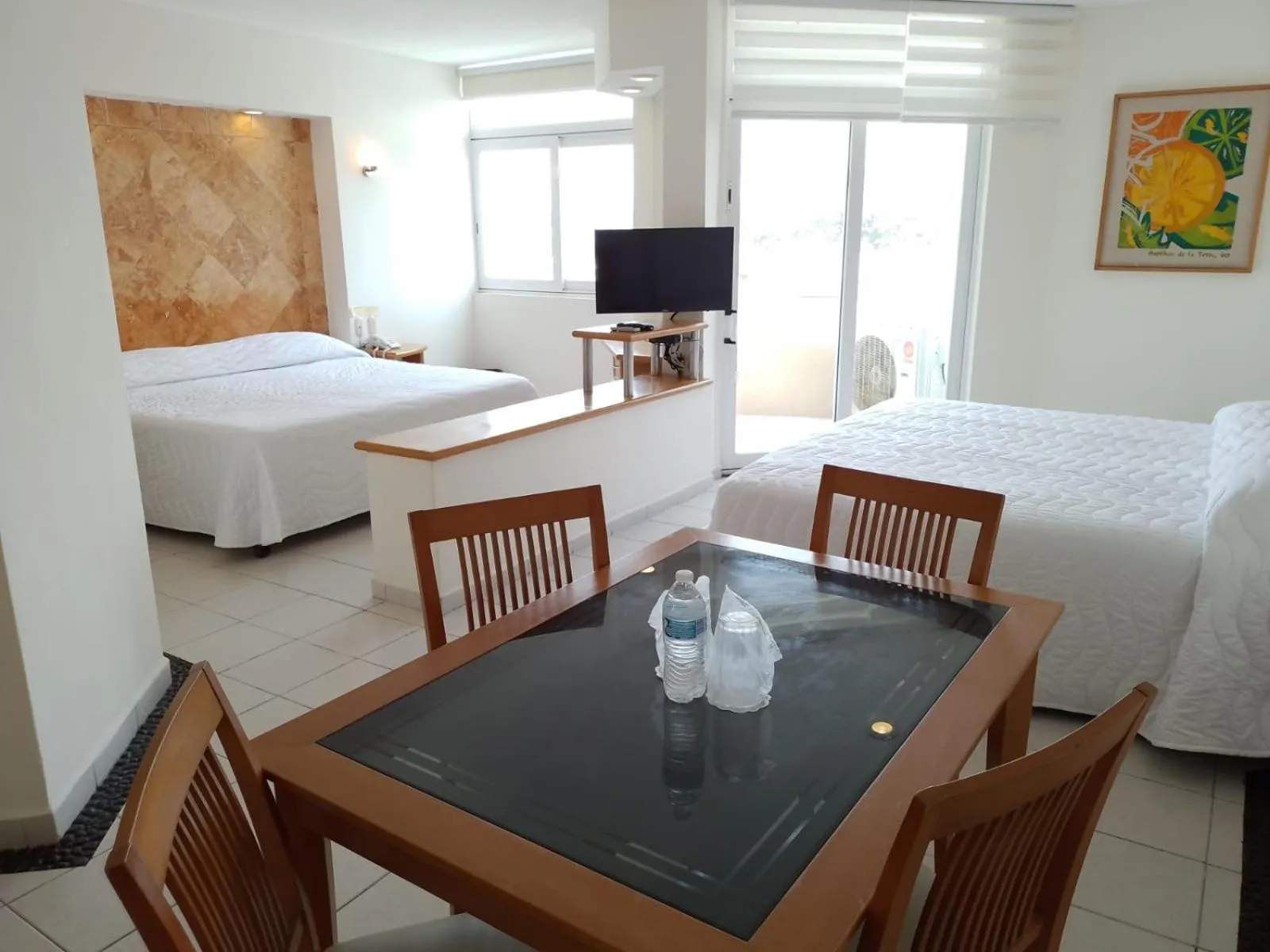 Photo of the whole room, Bed in Angeles Suites & Hotel