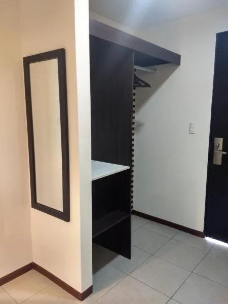 wardrobe in Angeles Suites & Hotel