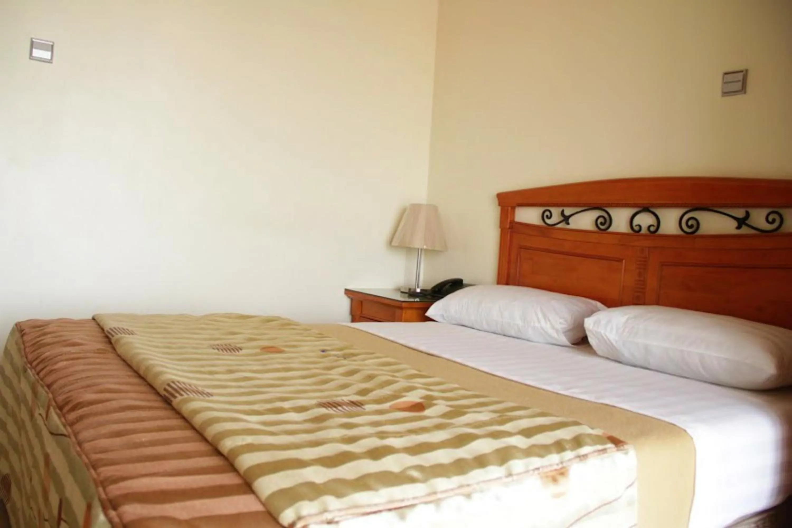 Bed in Landmark View Hotel