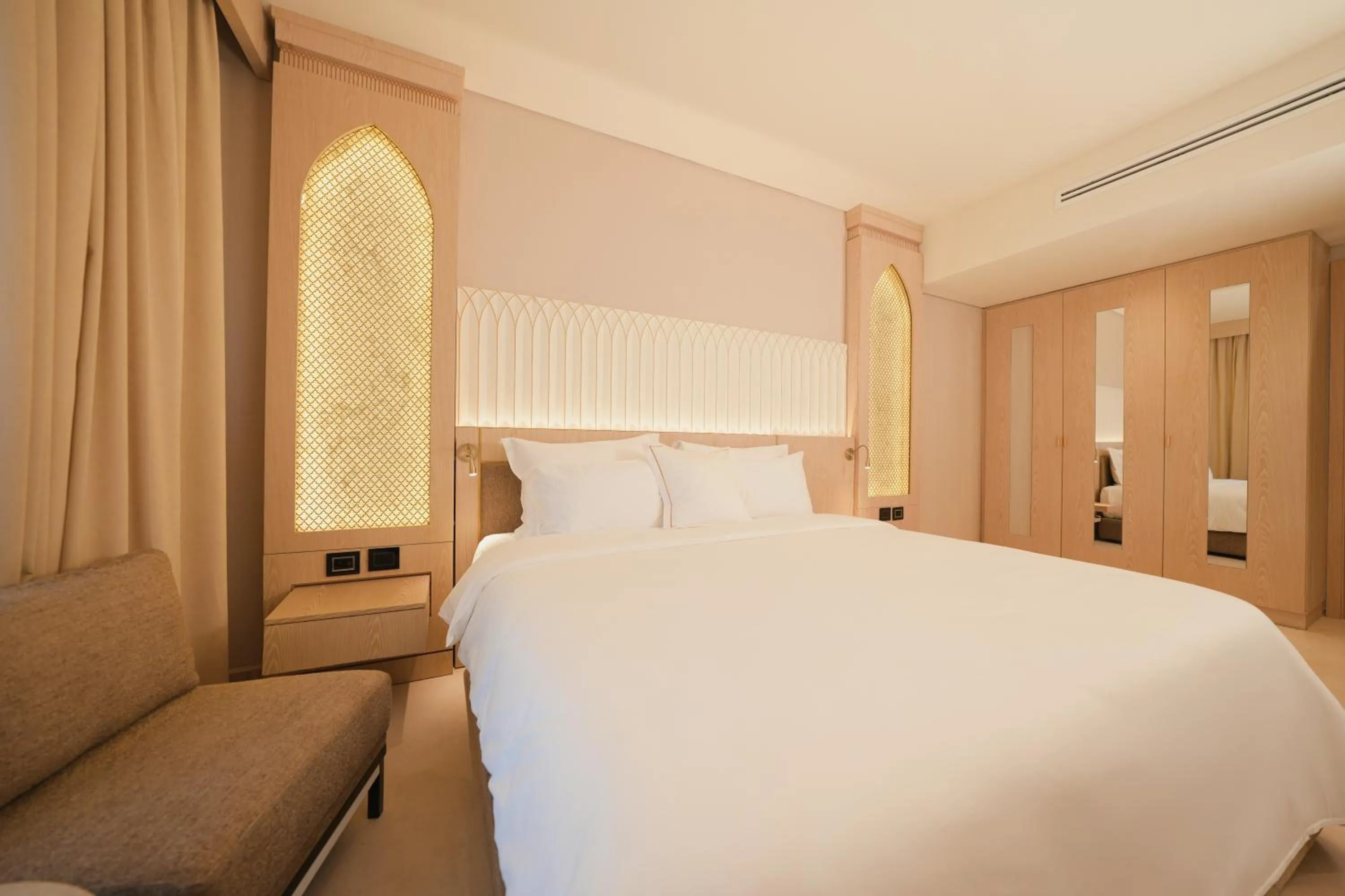 Bed in World Heart Hotel