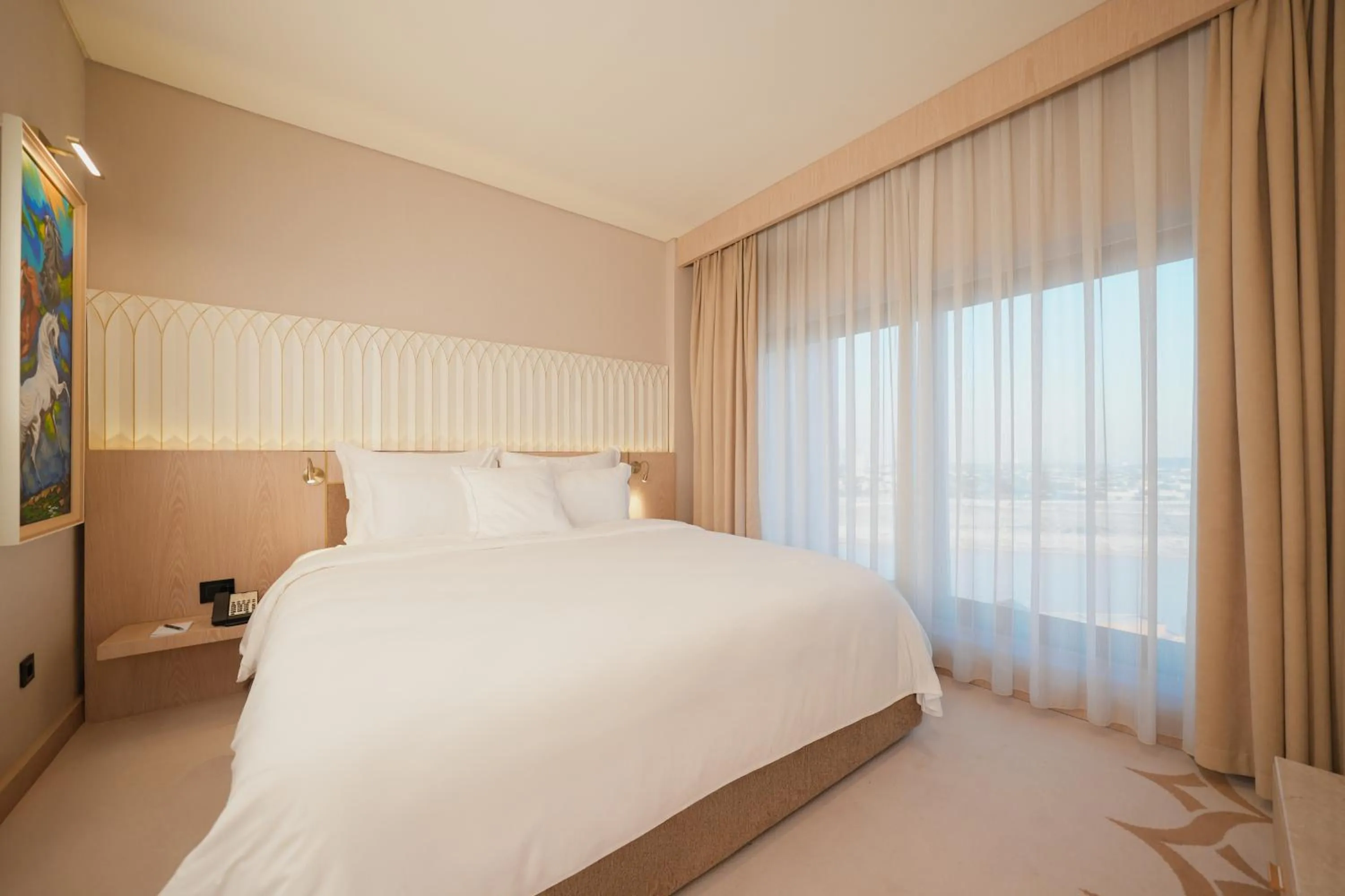 Bed in World Heart Hotel