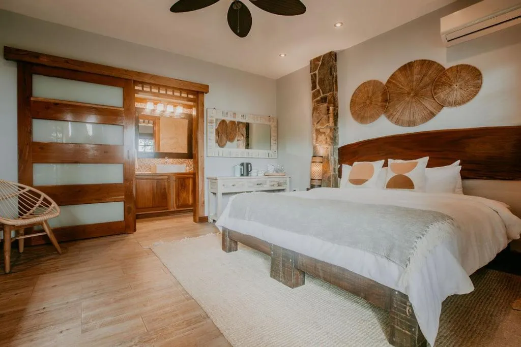 Photo of the whole room, Bed in Sansara Surf Yoga & Resort