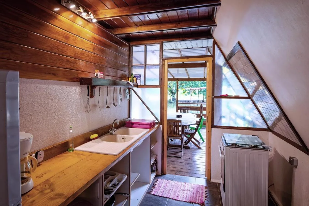 Kitchen or kitchenette in Pension Les Trois Cascades