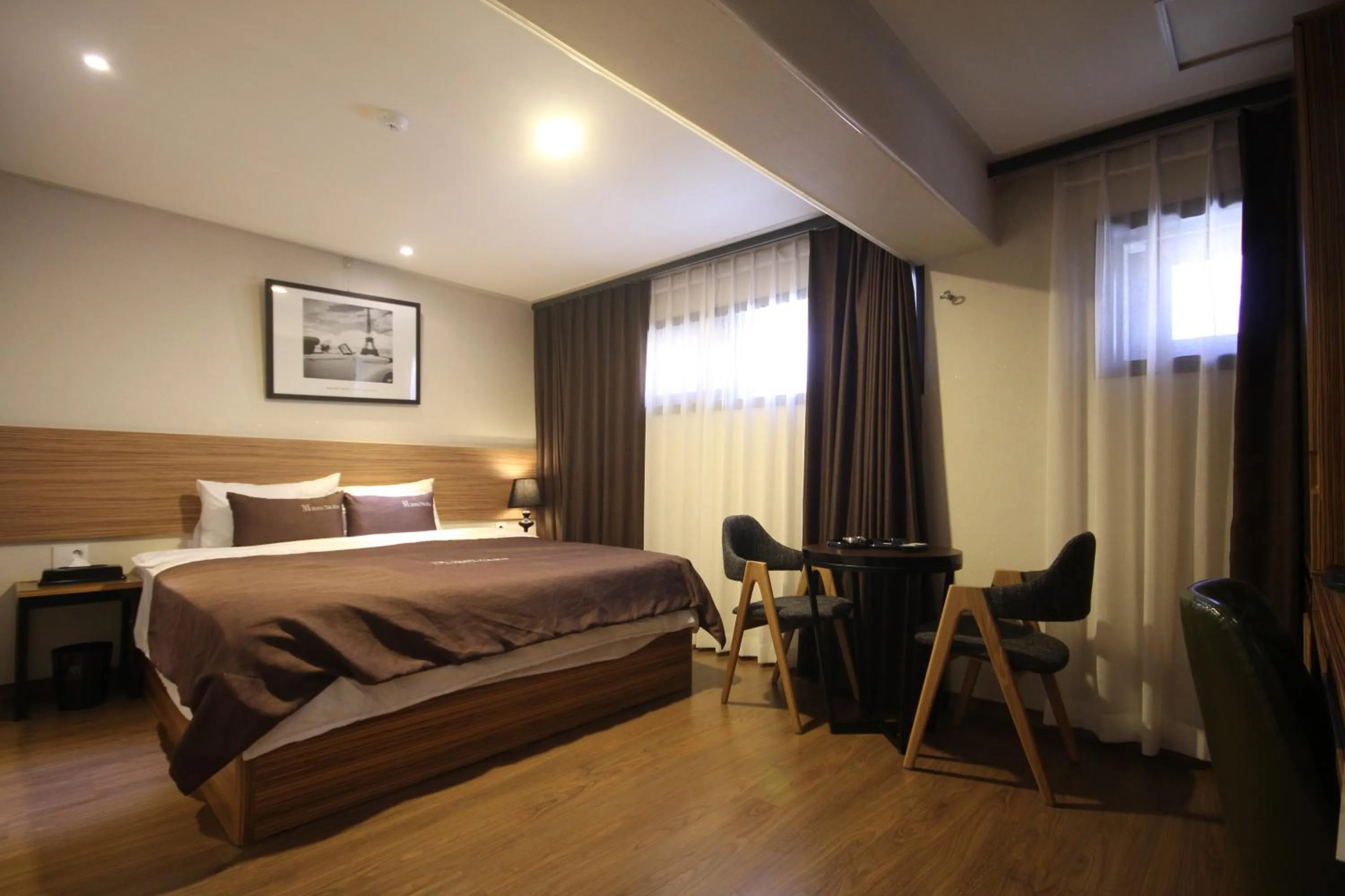 Bedroom, Bed in The May Hotel