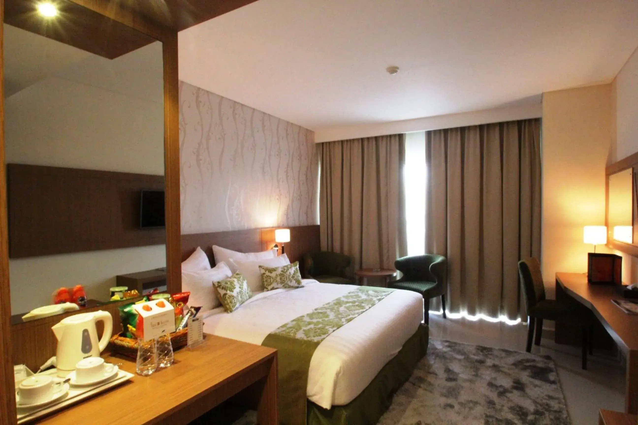 Bed in Ijen Suites Resort & Convention Bed in Ijen Suites Resort & Convention