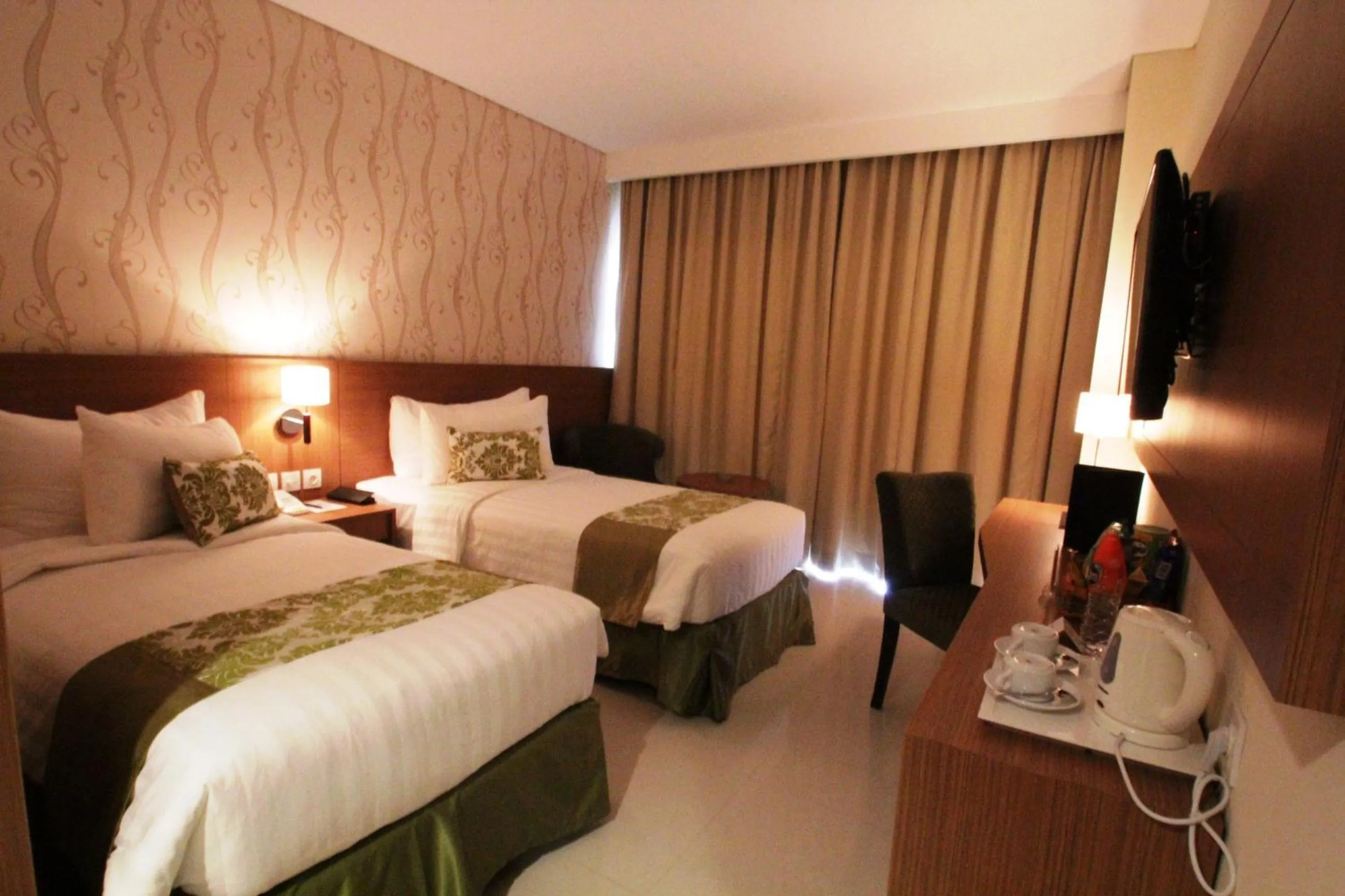 Bed in Ijen Suites Resort & Convention