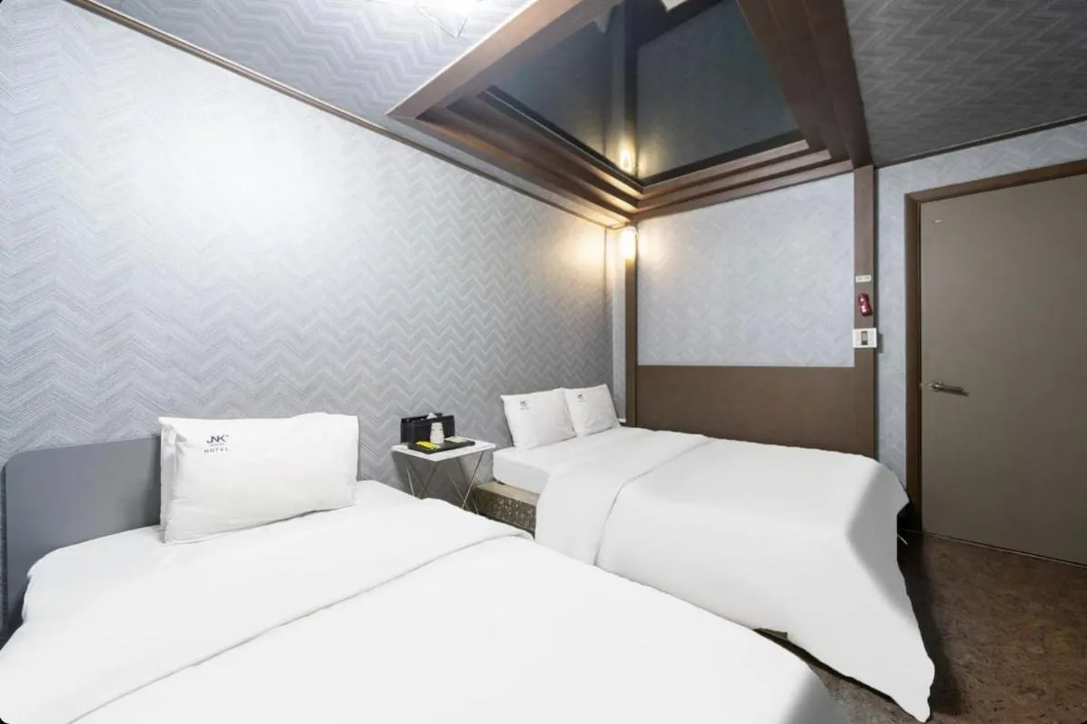 Bed in Daejeon Yongmun JNK Classic Hotel