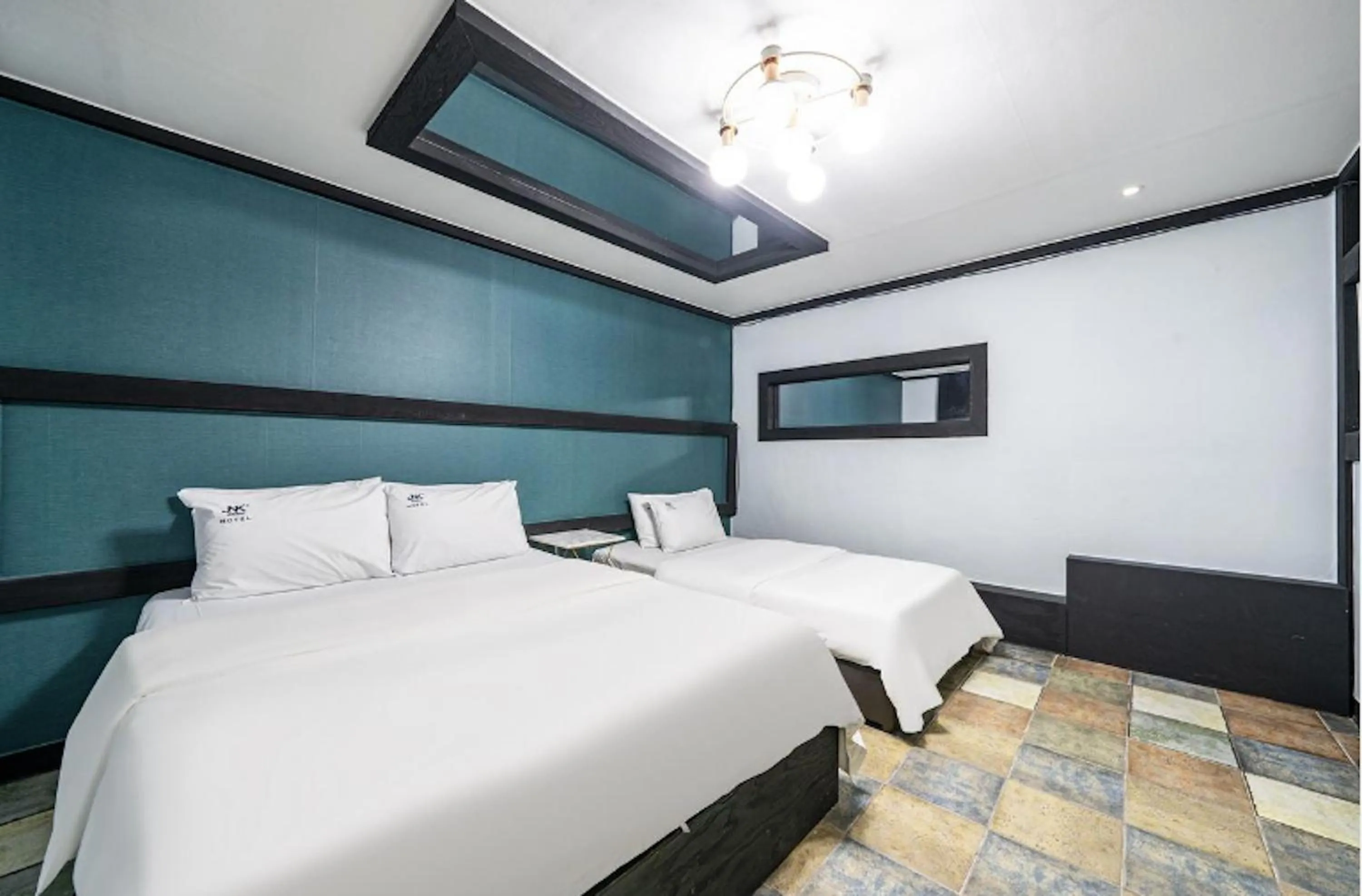 Bed in Daejeon Yongmun JNK Classic Hotel