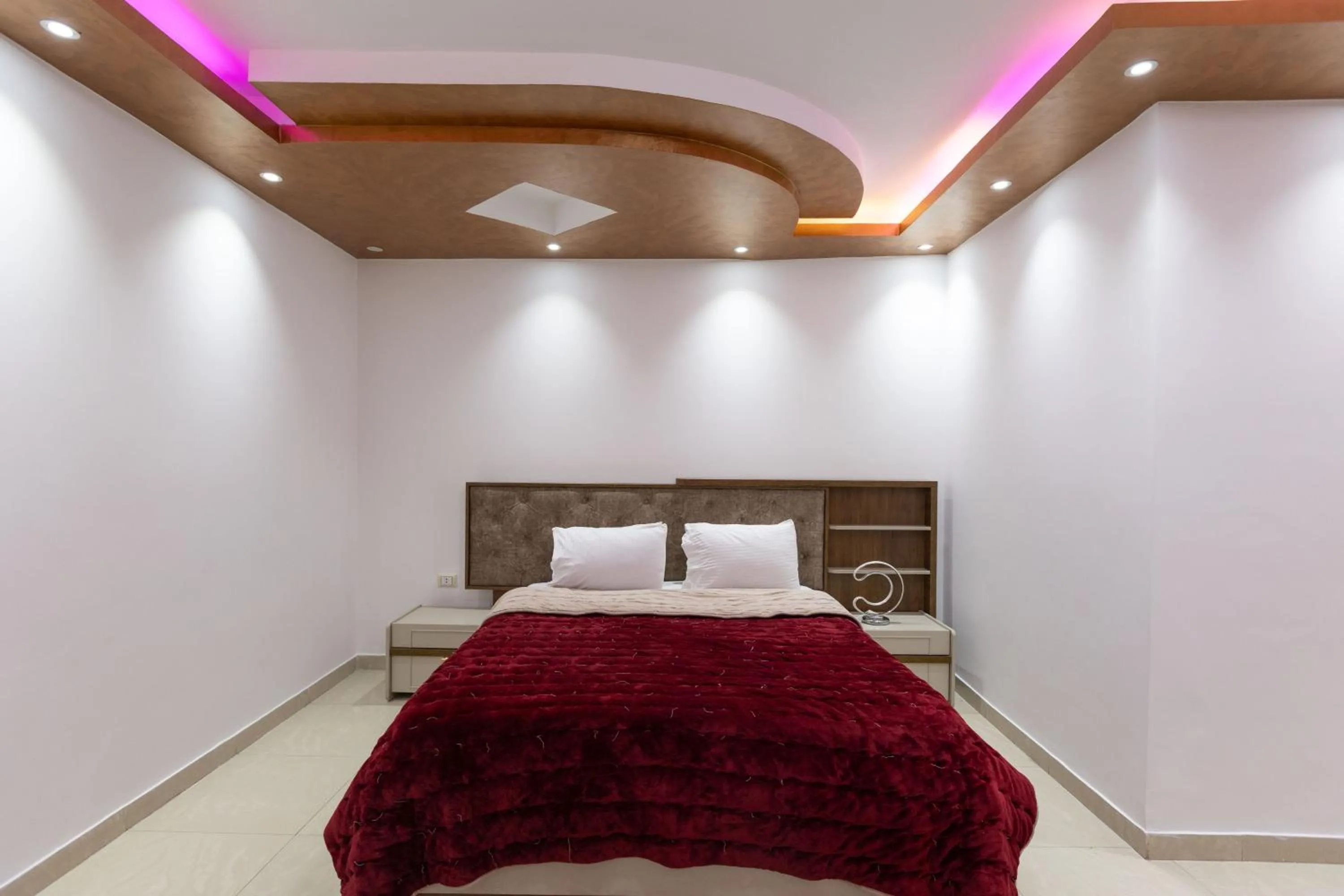 Bed in Pyramids Yard Hotel