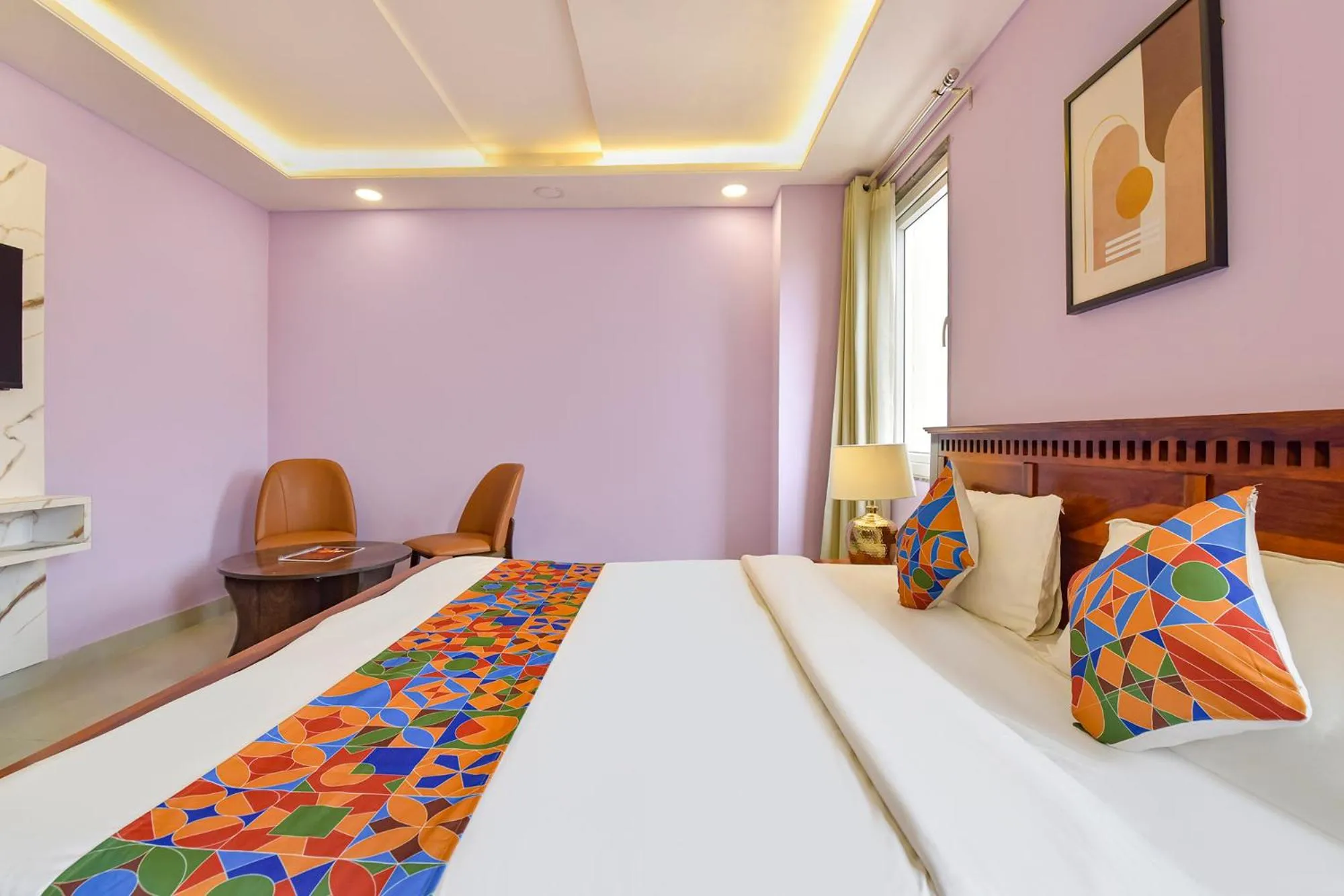 Bed in FabHotel Pink Palace Raja Park