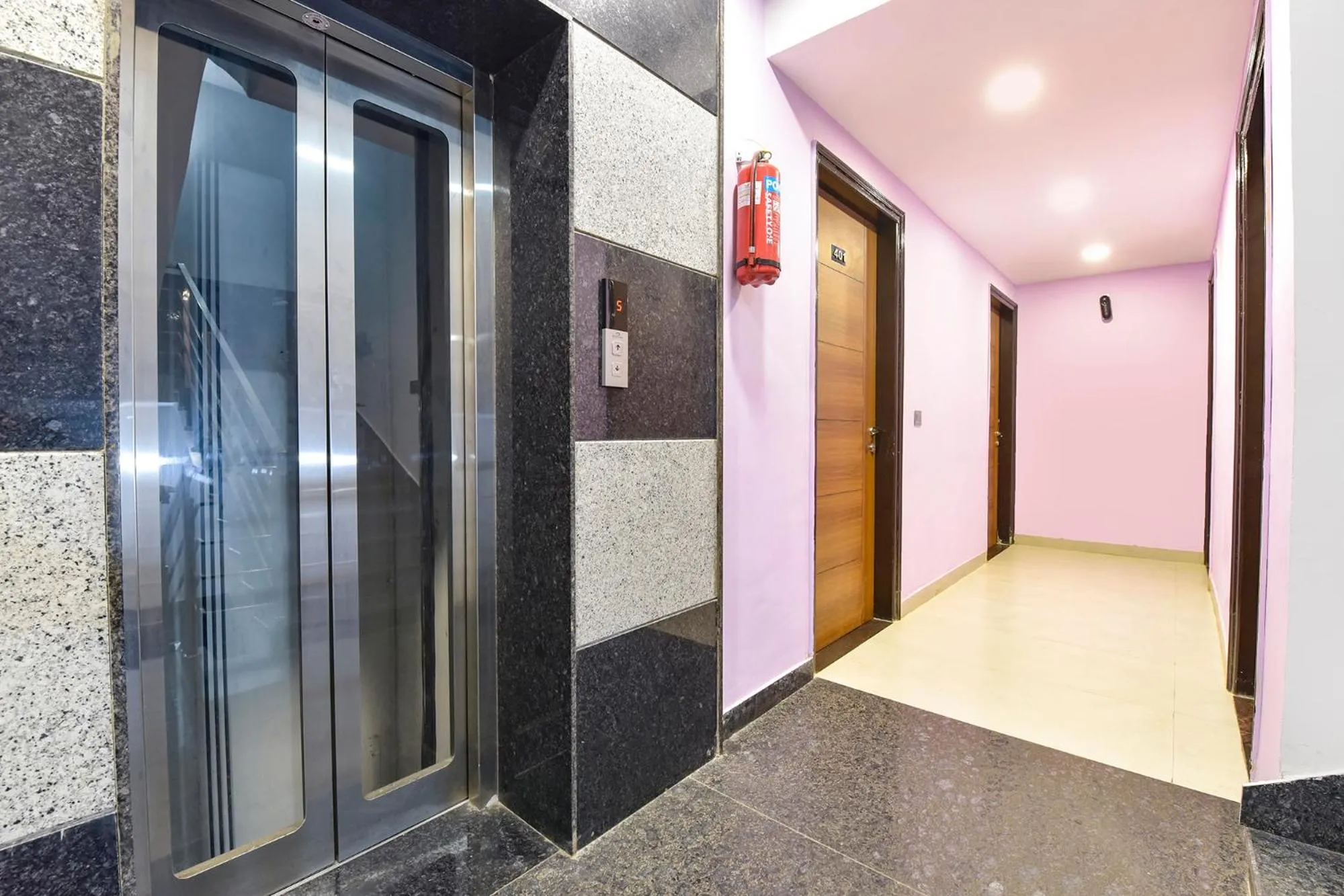 elevator in FabHotel Pink Palace Raja Park