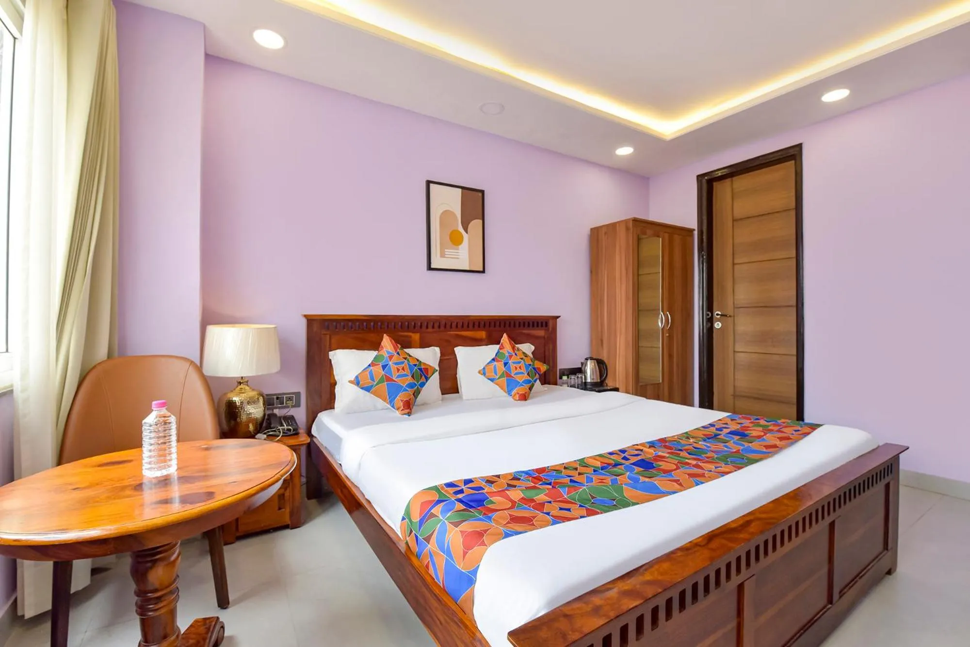 Bed in FabHotel Pink Palace Raja Park