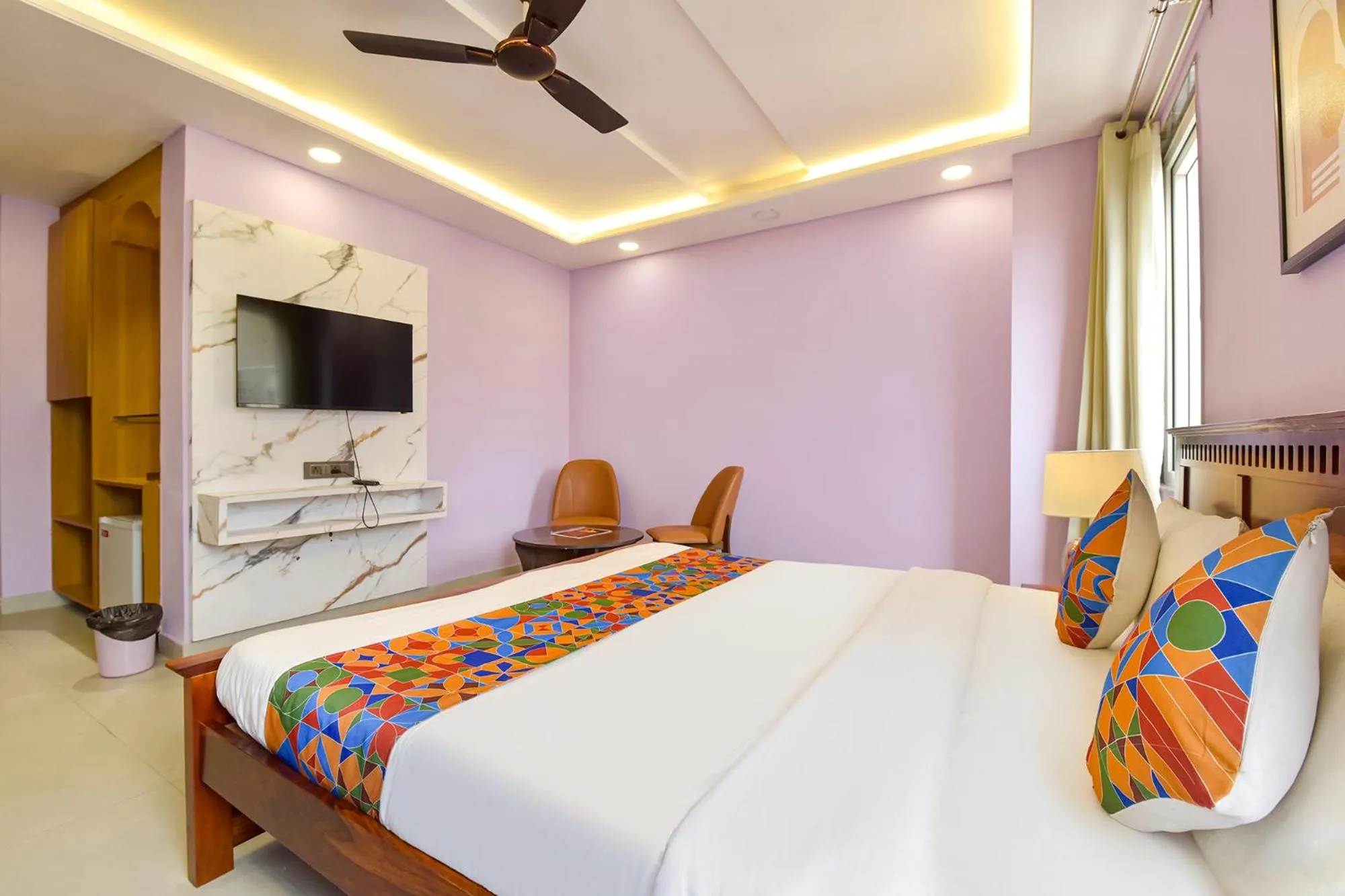 Bed in FabHotel Pink Palace Raja Park