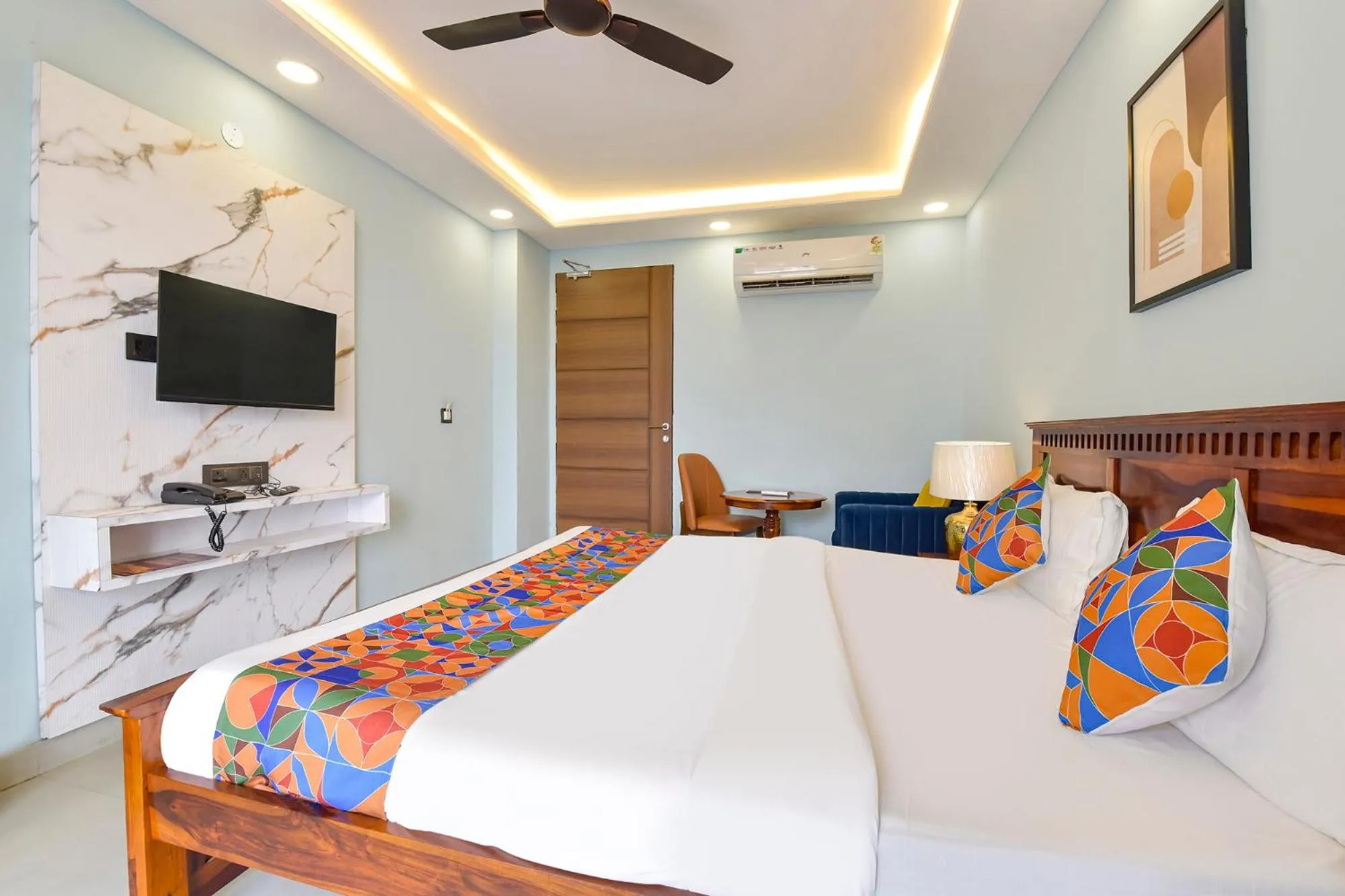 Bed in FabHotel Pink Palace Raja Park