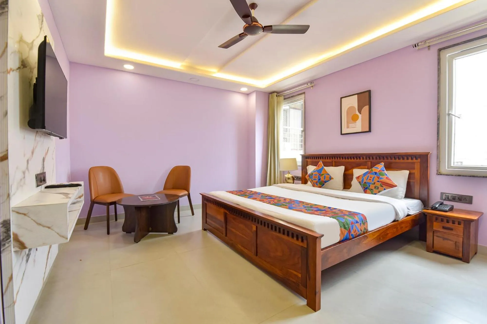 Bed in FabHotel Pink Palace Raja Park