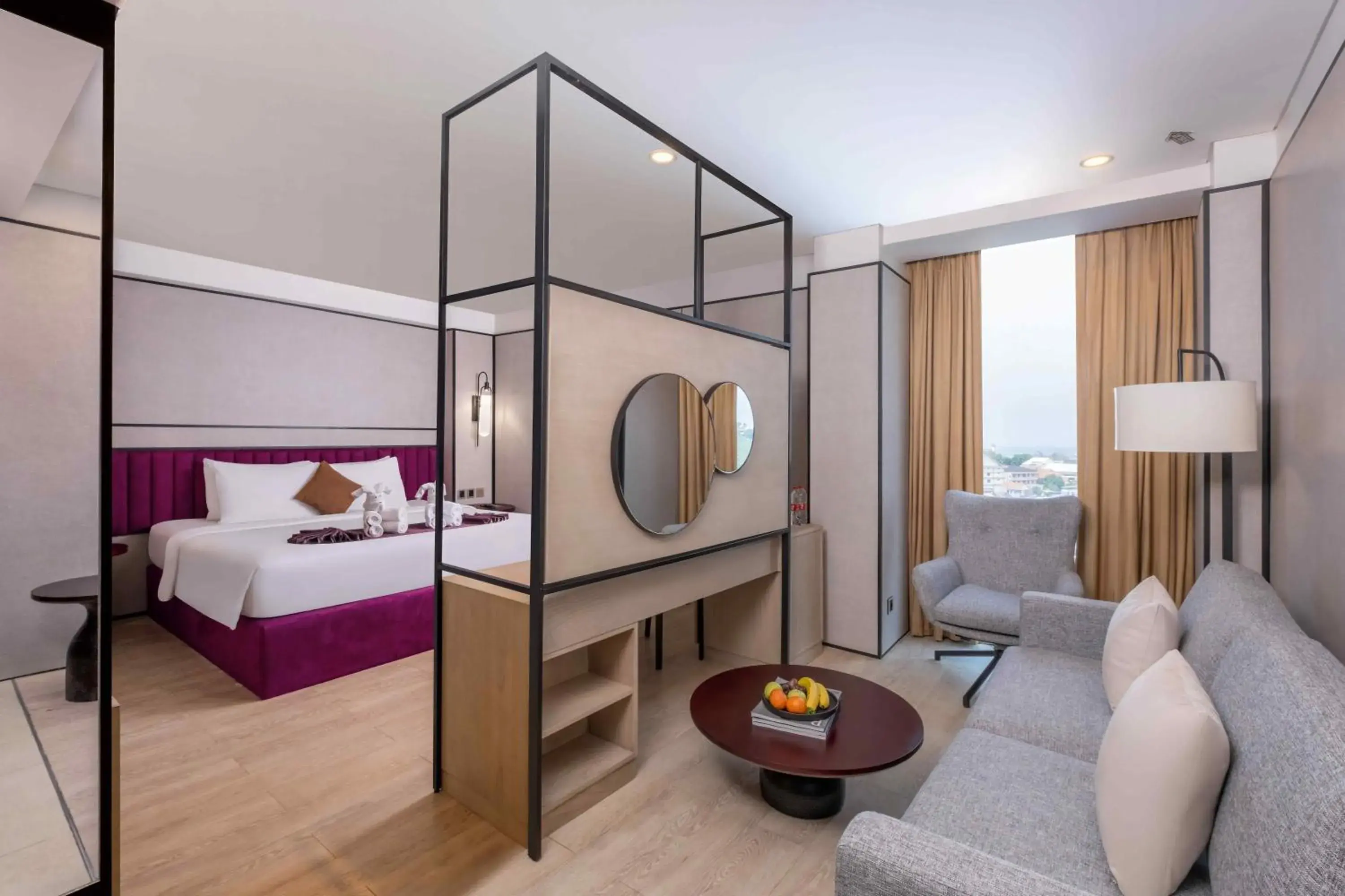 Living room, Bed in Grand Edge Hotel Semarang Living room, Bed in Grand Edge Hotel Semarang