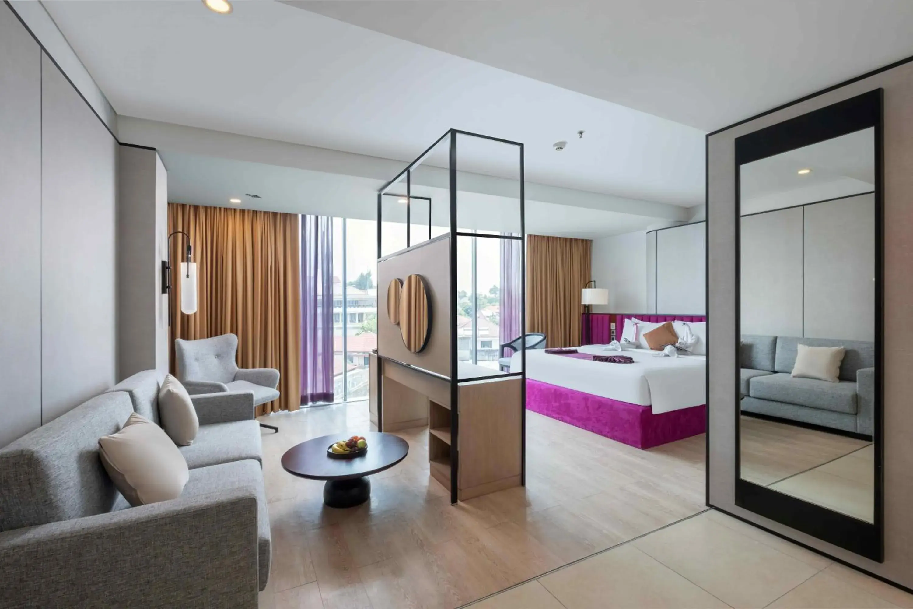 Living room, Bed in Grand Edge Hotel Semarang Living room, Bed in Grand Edge Hotel Semarang