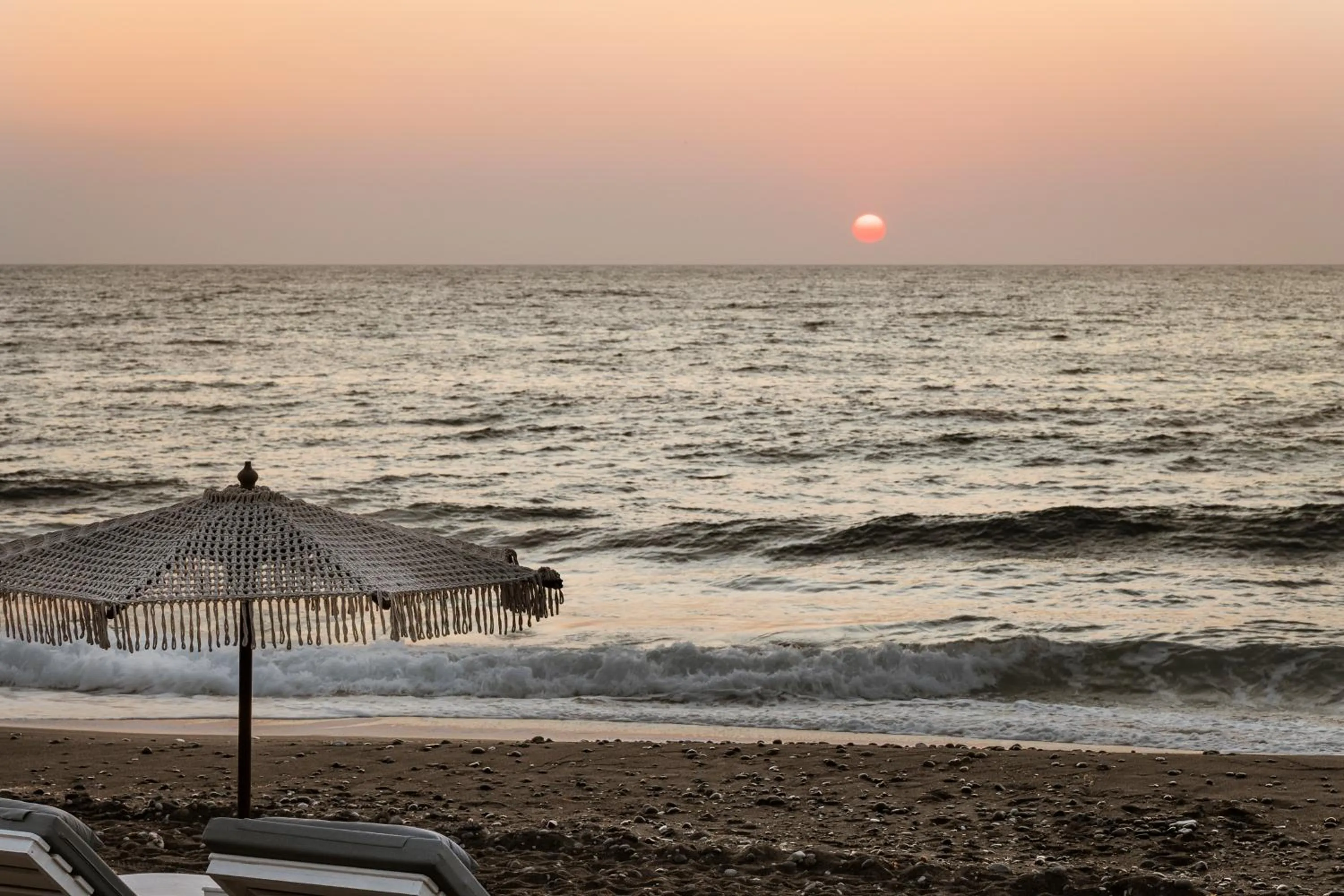 Beach in AMĀRIA Beach Resort by NOMÉE Hospitality Group