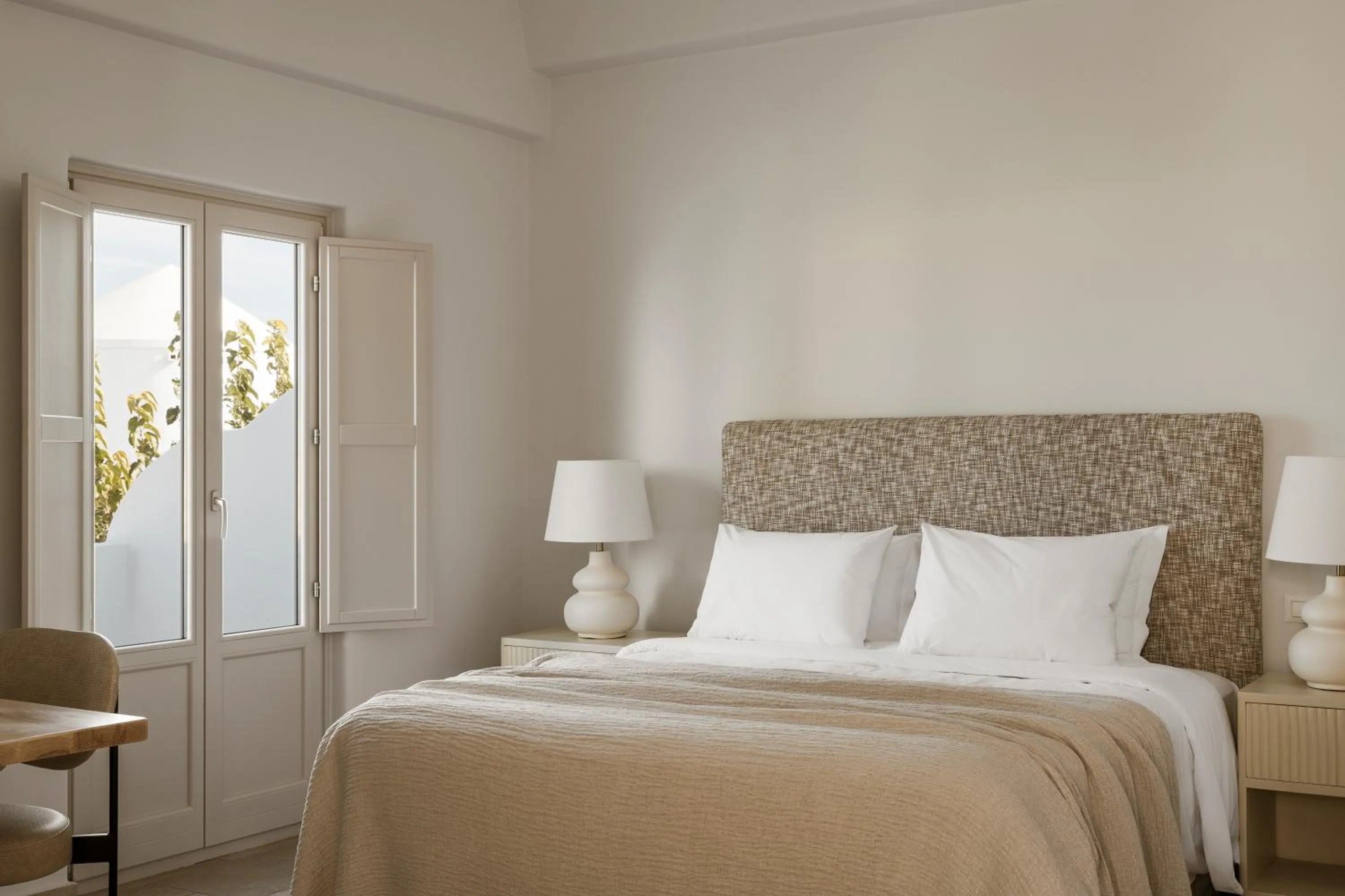 Bed in AMĀRIA Beach Resort by NOMÉE Hospitality Group