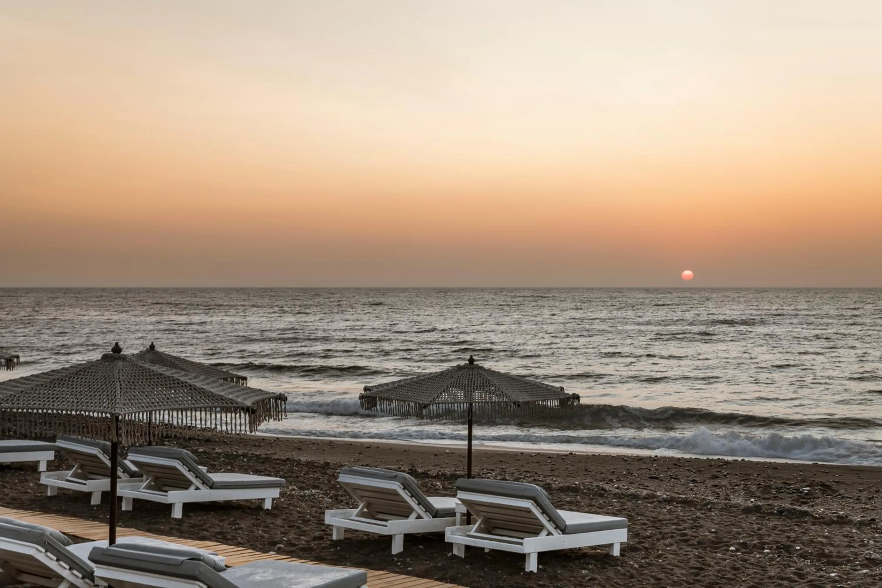 Beach in AMĀRIA Beach Resort by NOMÉE Hospitality Group