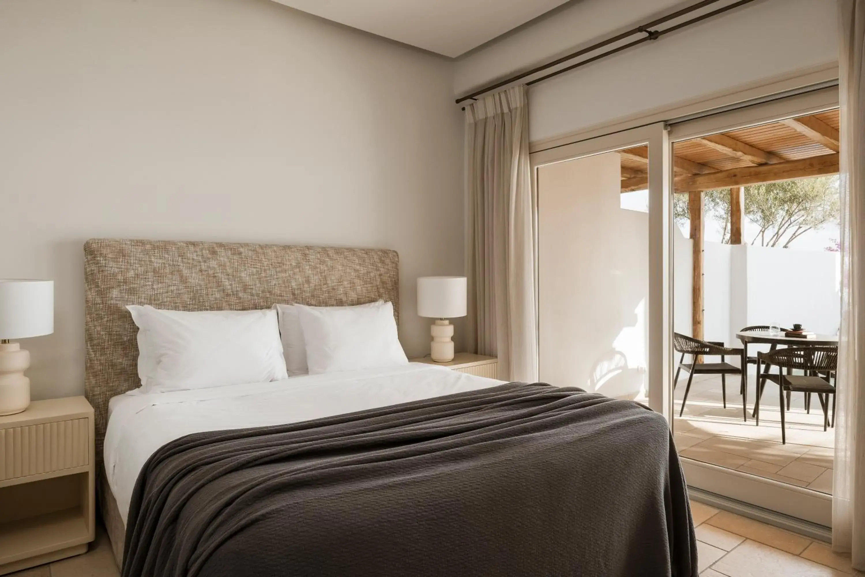 Patio, Bed in AMĀRIA Beach Resort by NOMÉE Hospitality Group Patio, Bed in AMĀRIA Beach Resort by NOMÉE Hospitality Group