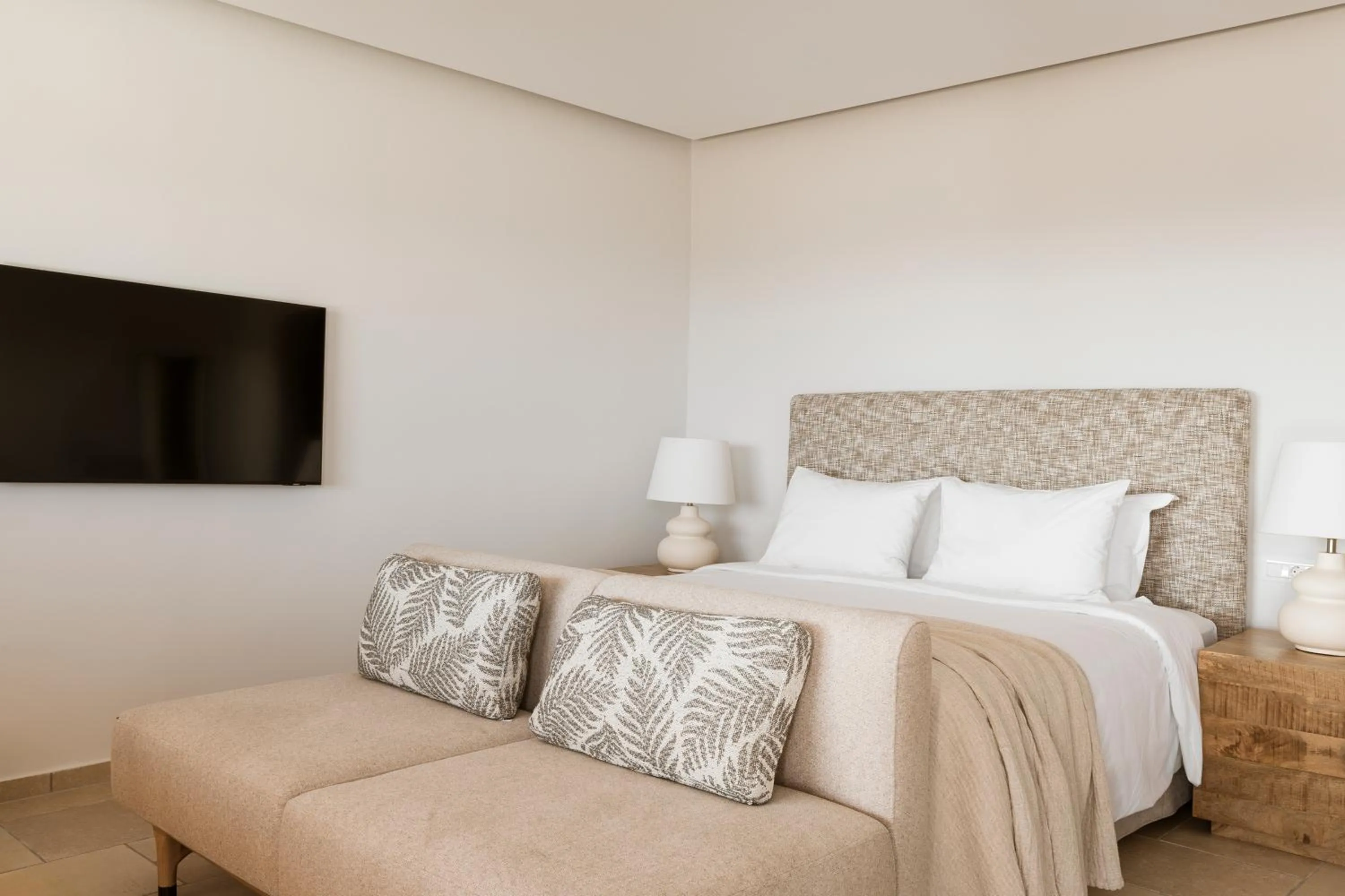 Bed in AMĀRIA Beach Resort by NOMÉE Hospitality Group