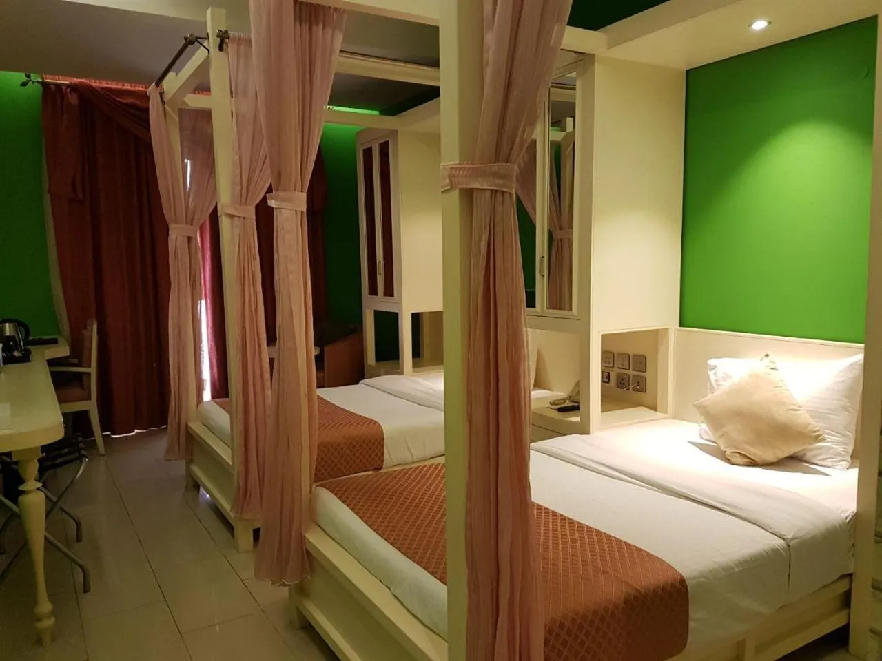 Bed in Reflections Hotel