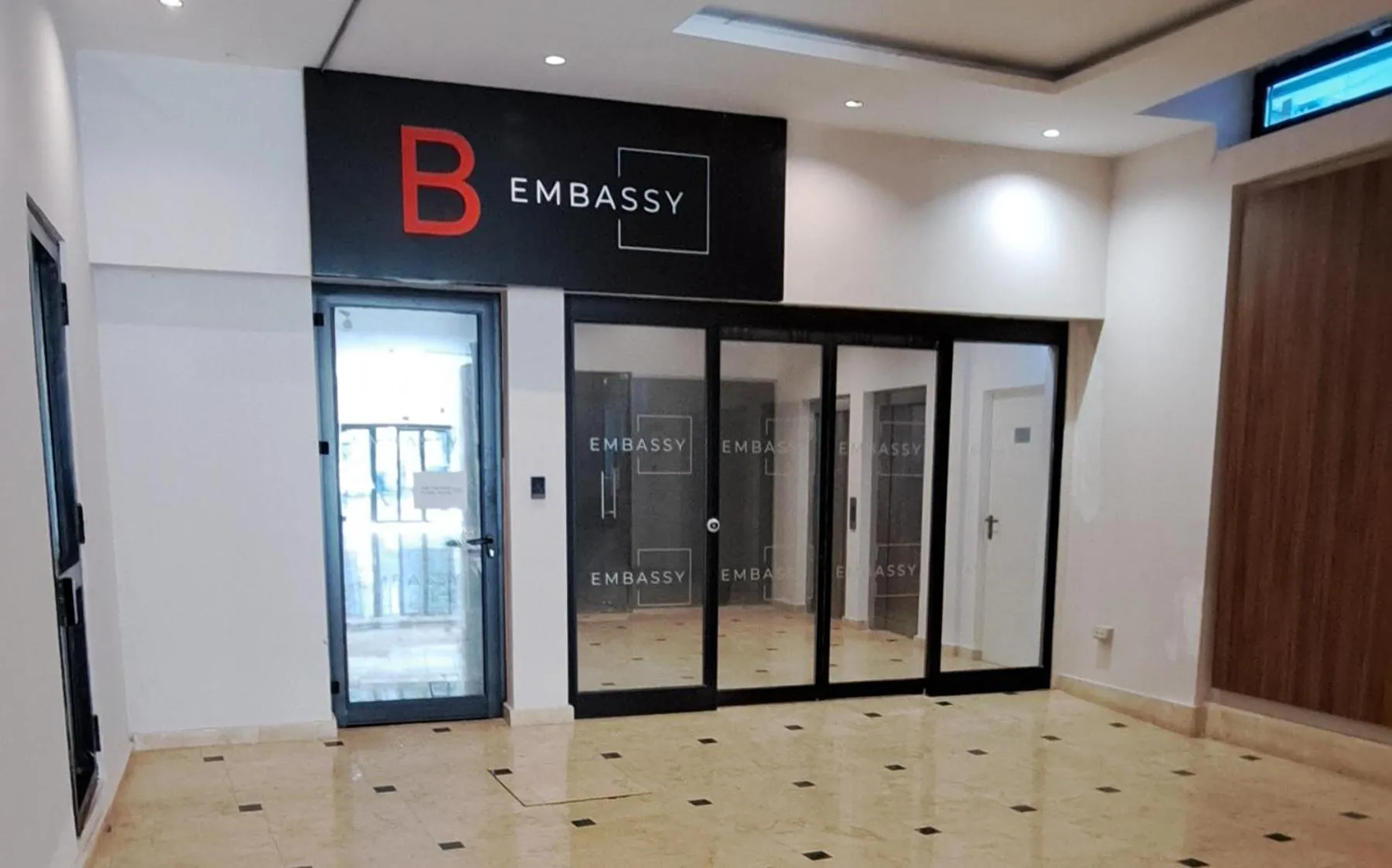 Property logo or sign in Embassy Romana