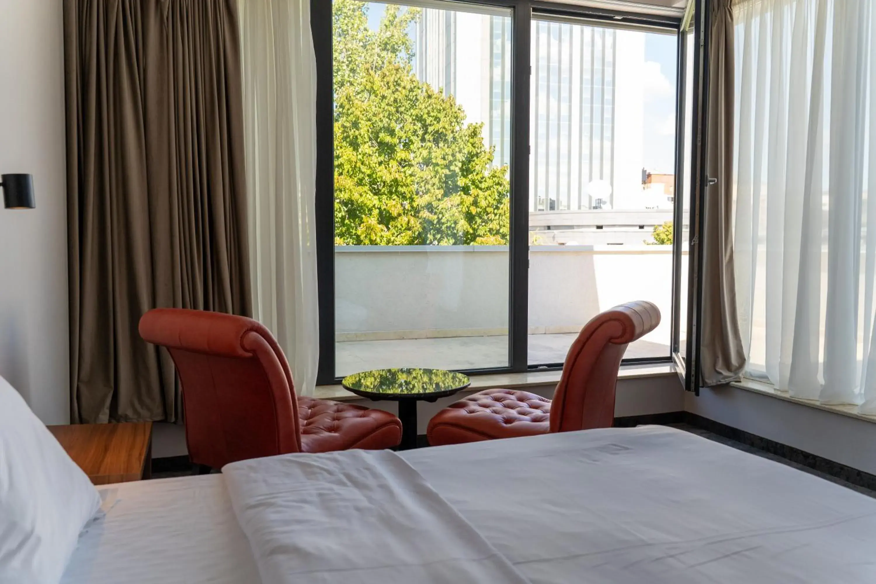 View (from property/room), Bed in Embassy Romana View (from property/room), Bed in Embassy Romana