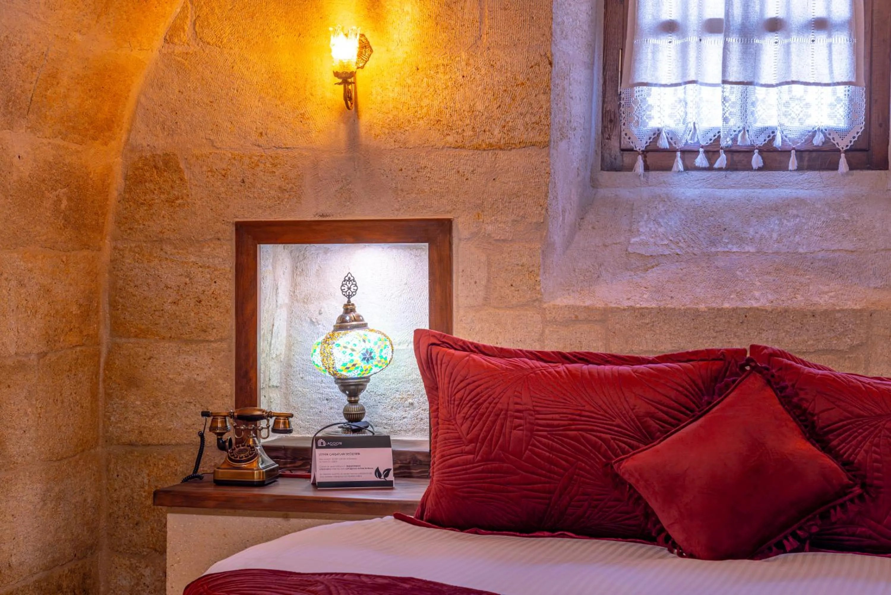 Bed in Lagoon Cave Suites