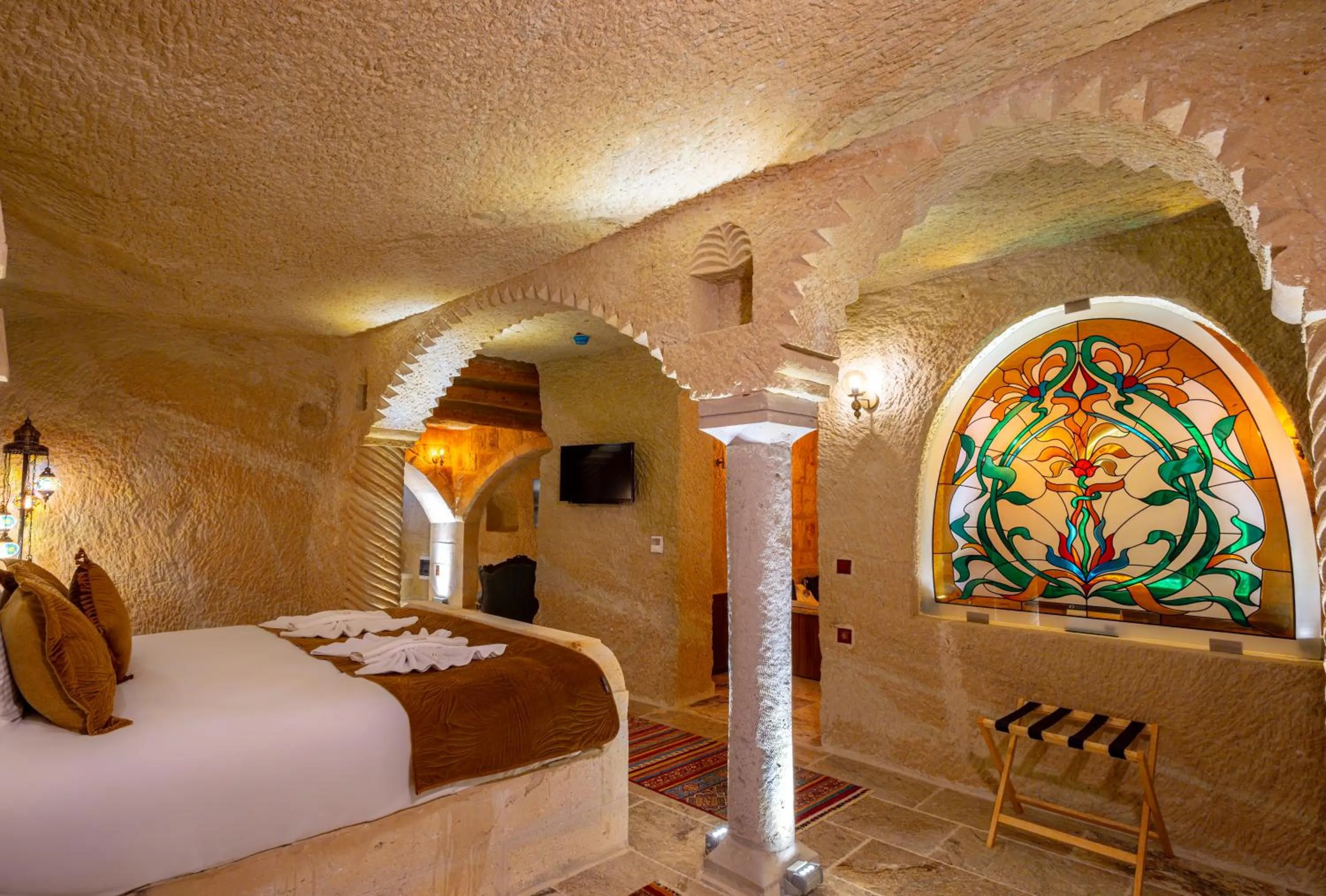 Bed in Lagoon Cave Suites