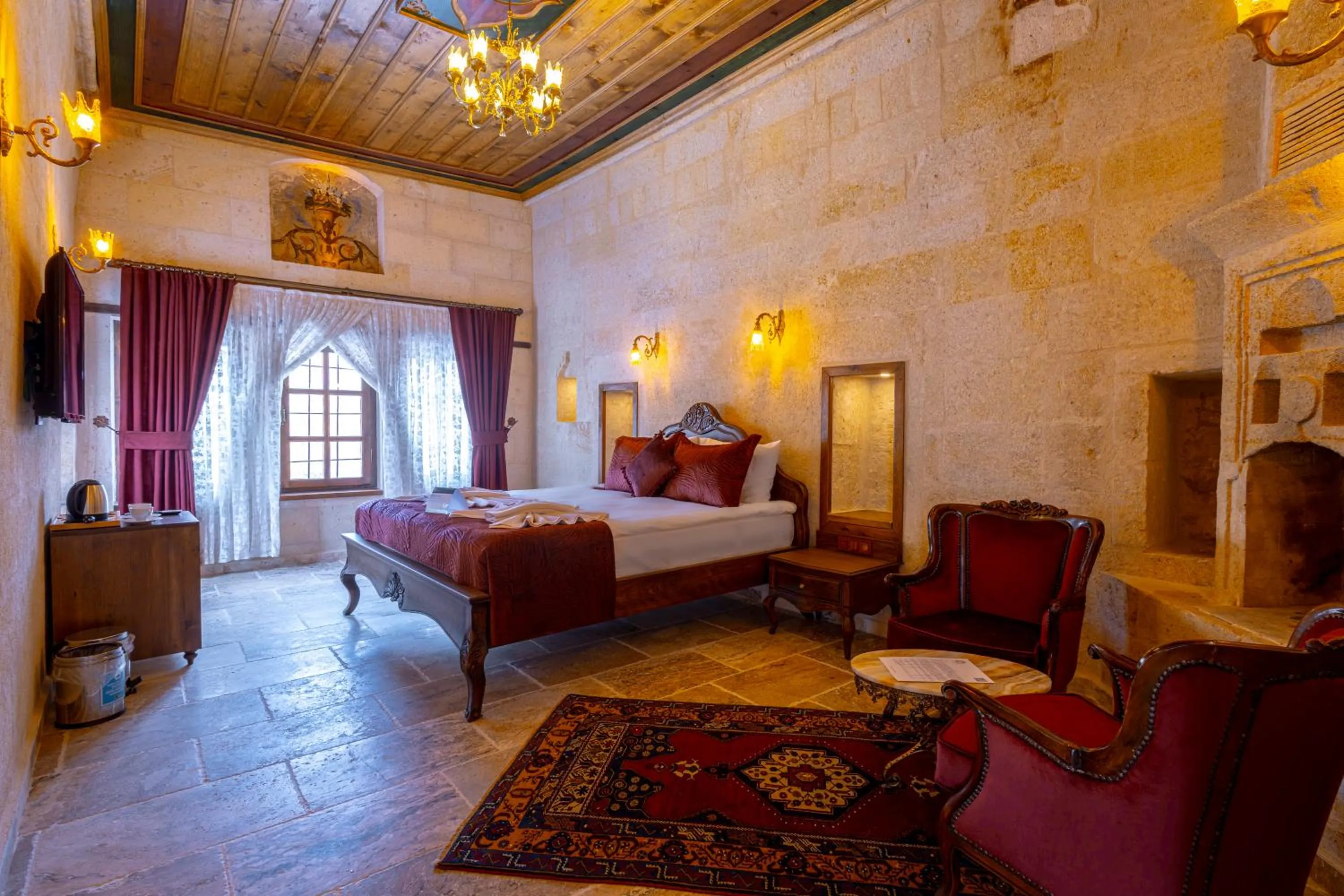 Bed in Lagoon Cave Suites