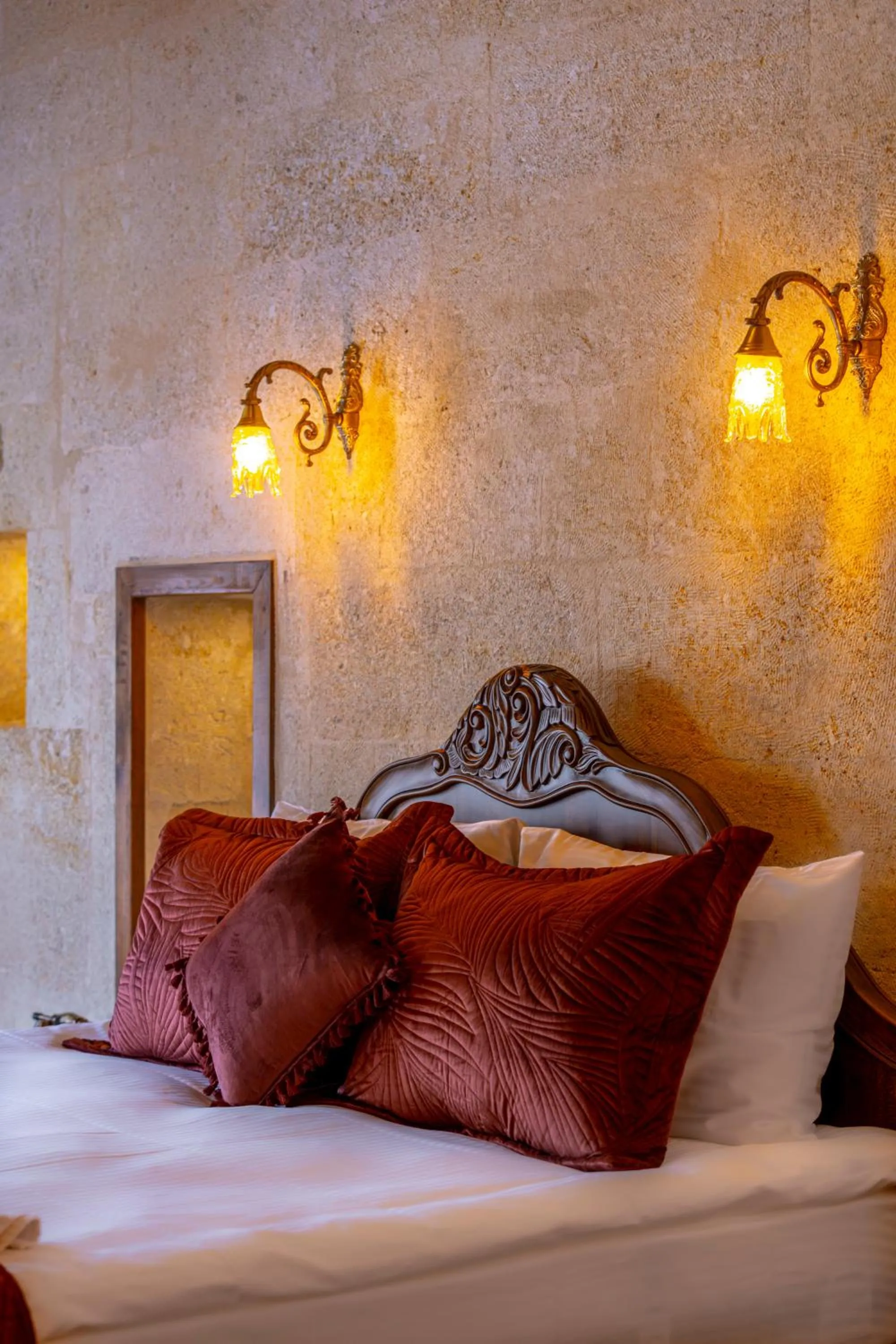 Bed in Lagoon Cave Suites